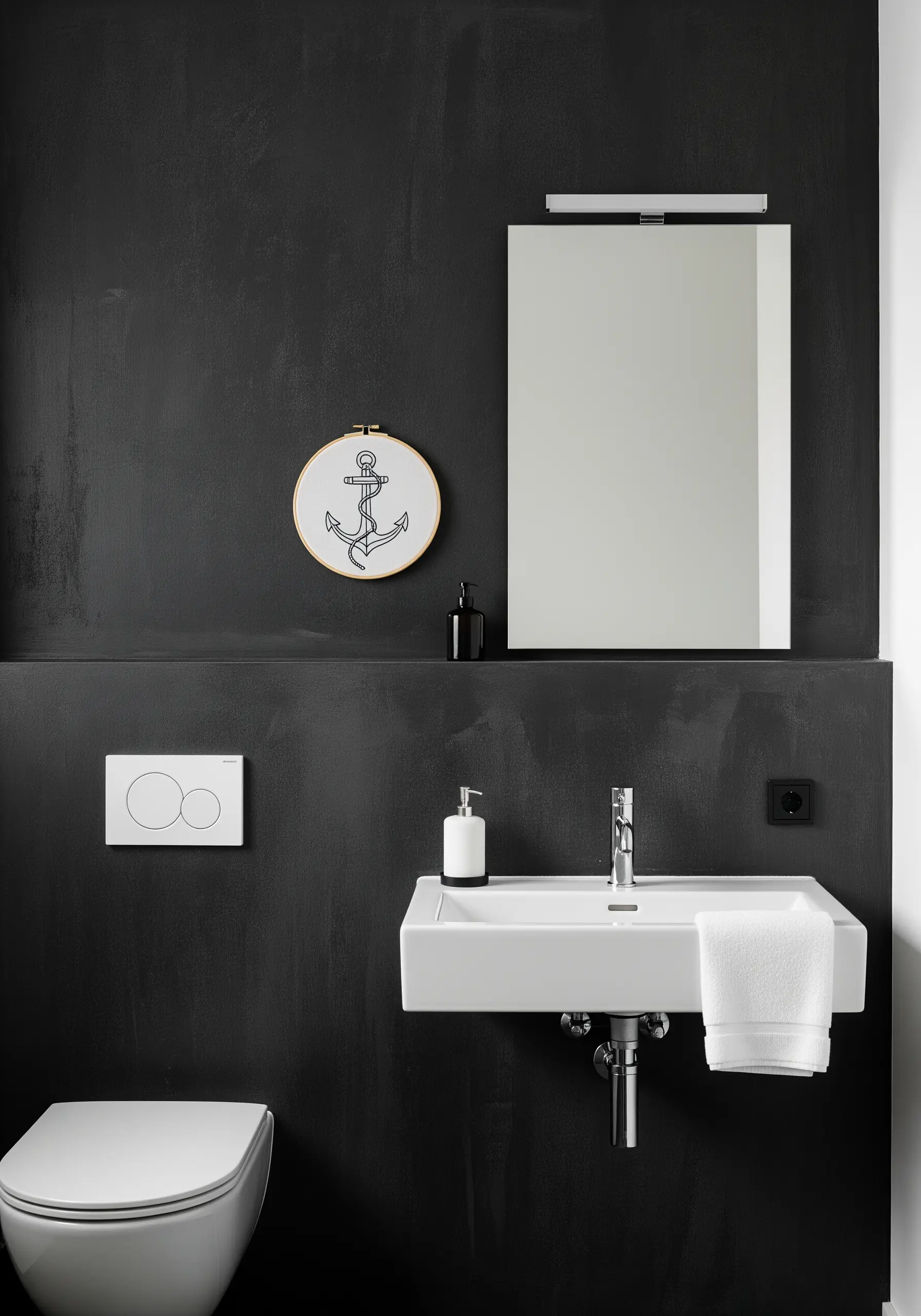 Minimalist line art anchor embroidered in white on dark fabric.