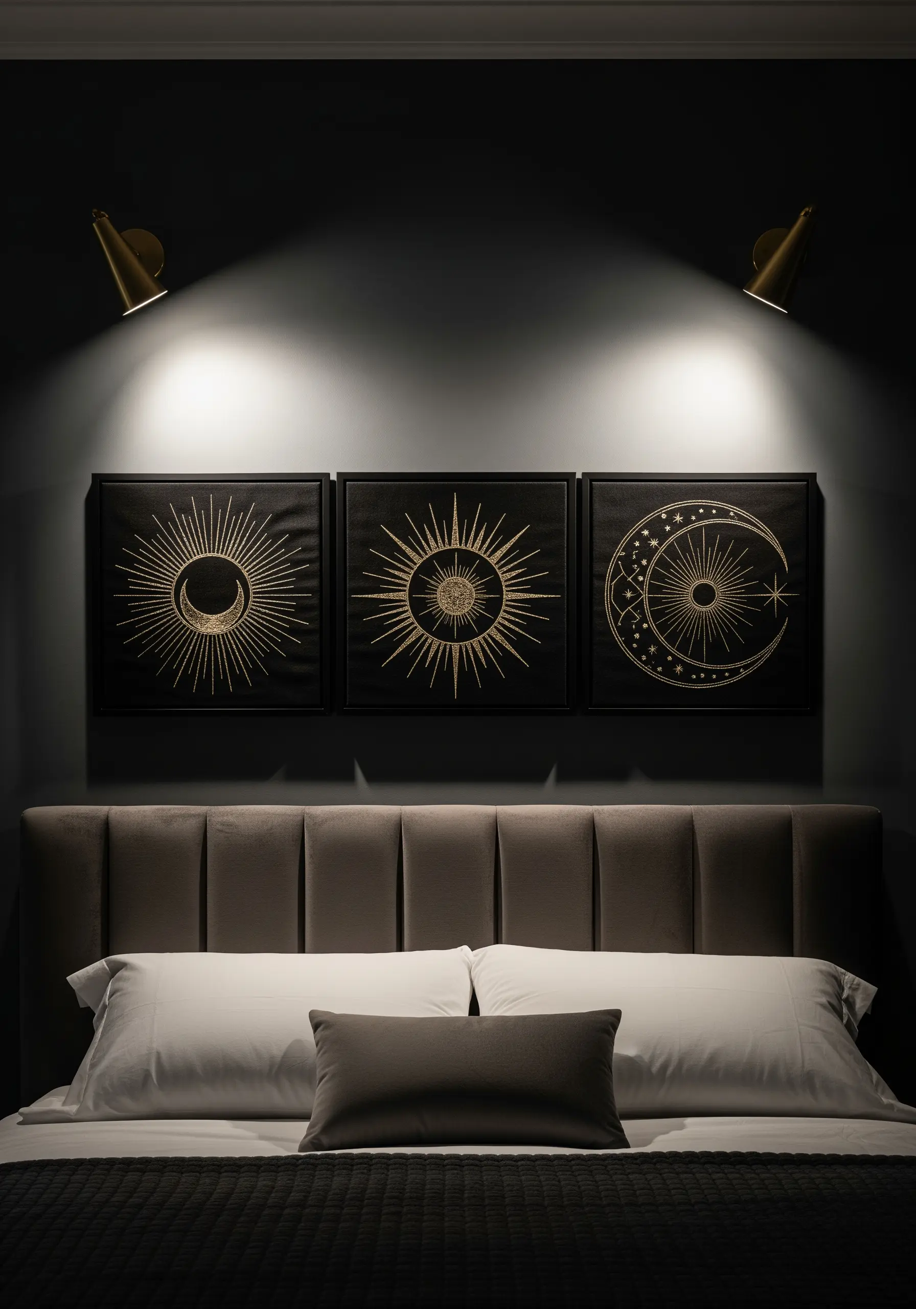 Triptych of framed celestial embroidery: sun, moon, and stars in gold thread on black fabric.