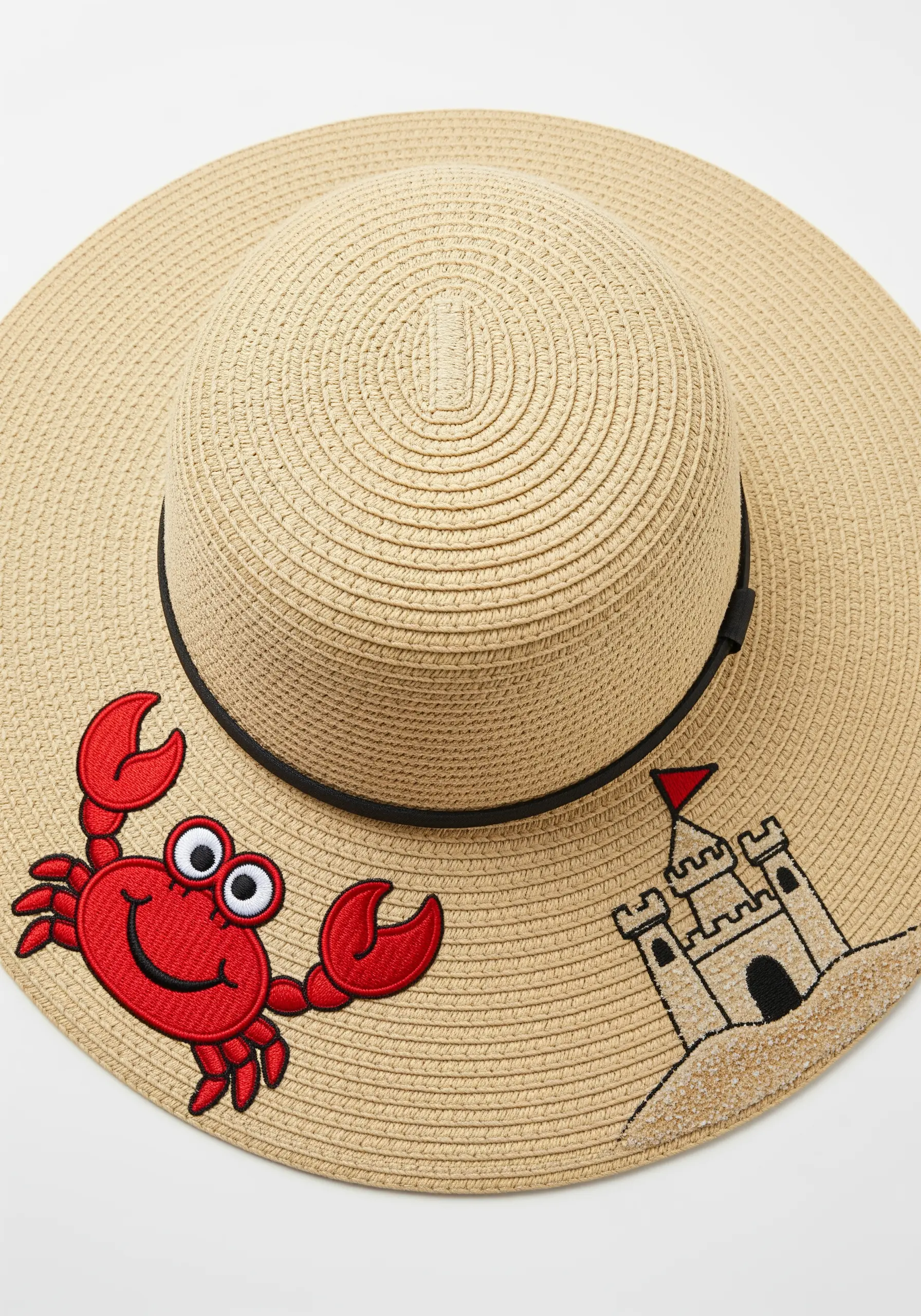 A red cartoon crab and a line-art sandcastle embroidered on the brim of a straw sun hat