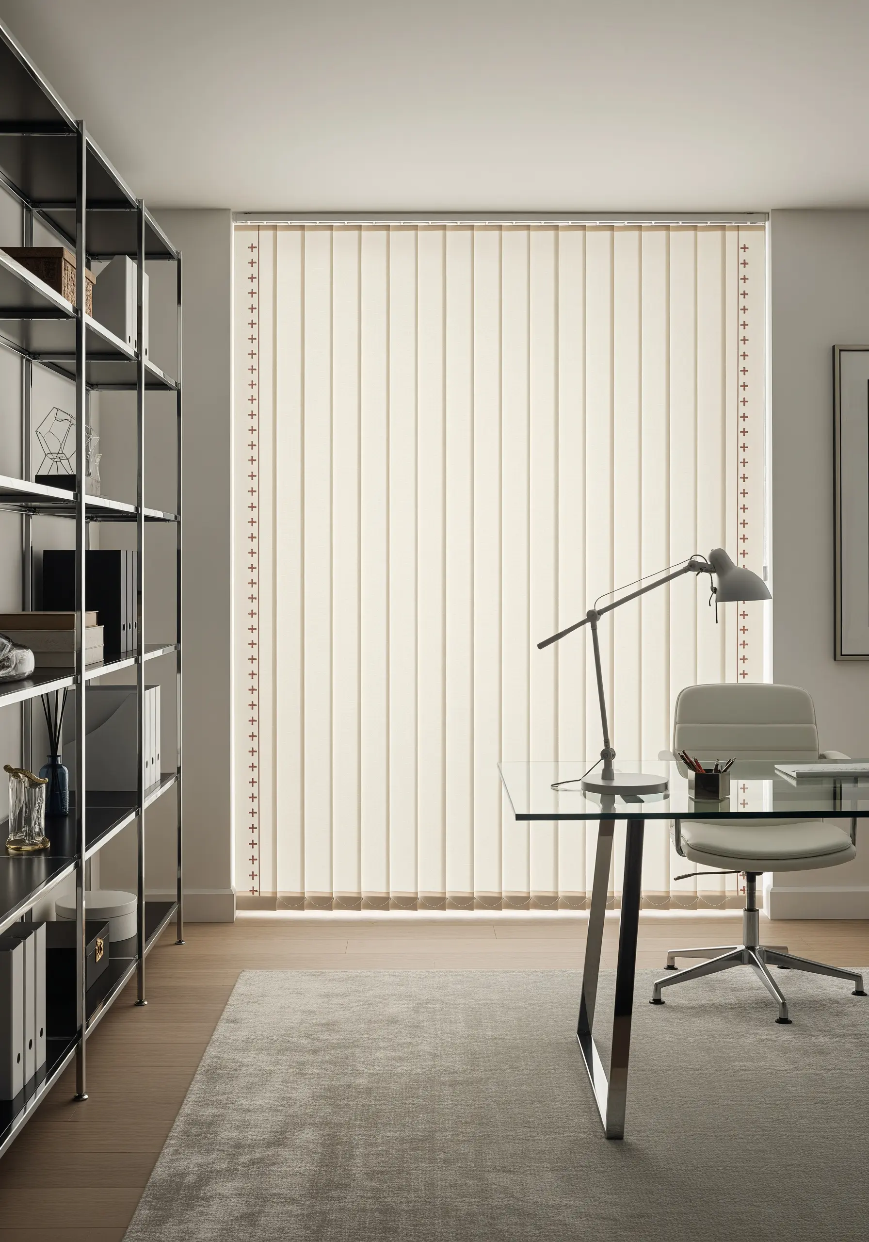 A simple border of embroidered cross-stitches down the edge of vertical blinds.