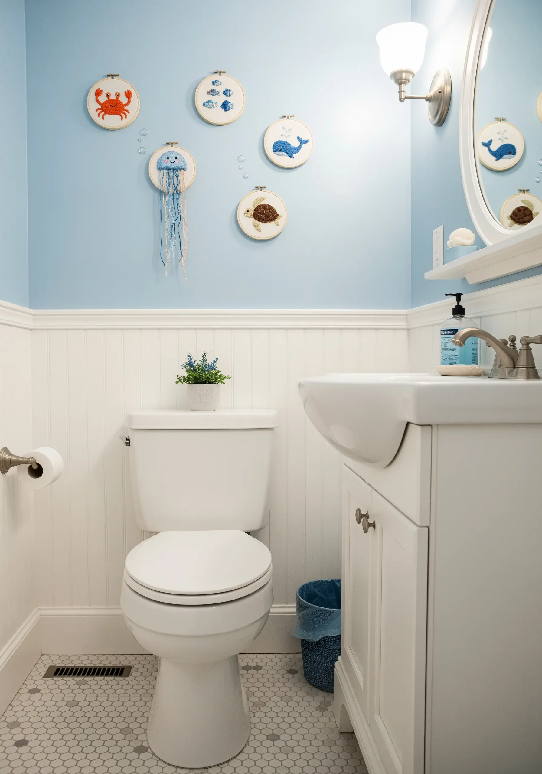 A collection of small hoops featuring a crab, jellyfish, whale, and turtle.