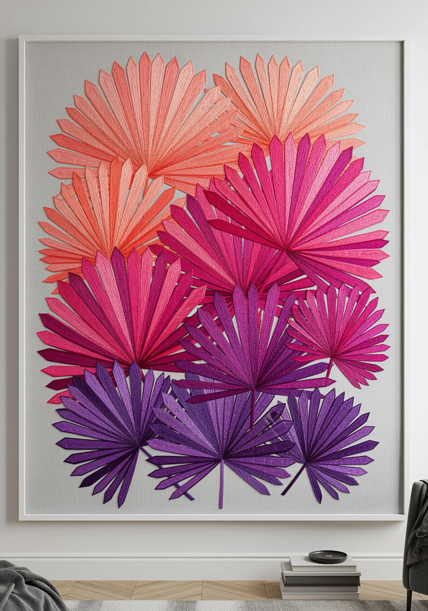 A large, framed embroidery of fanned palm leaves in a pink-to-purple gradient.