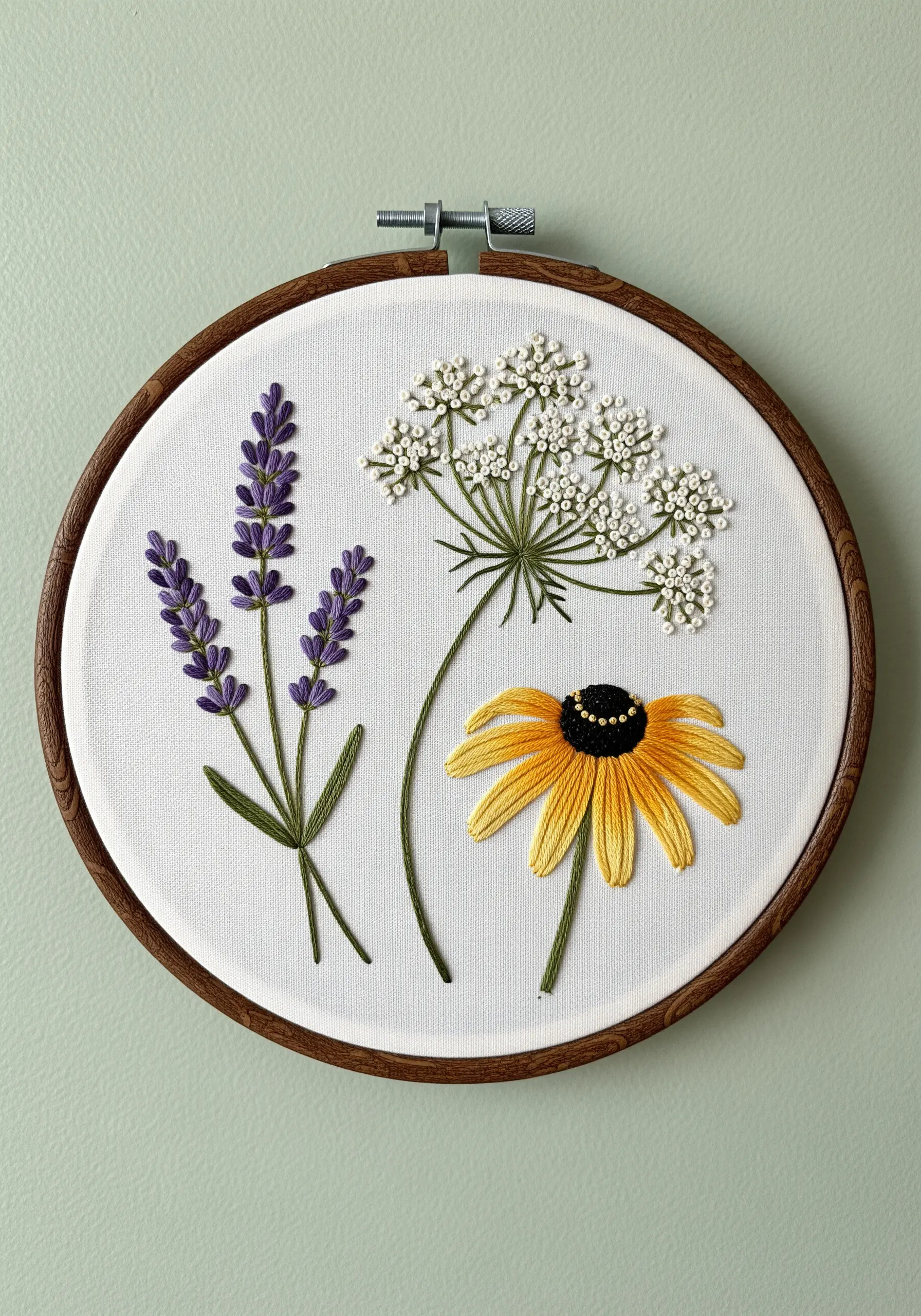 Embroidered lavender, Queen Anne's lace, and a black-eyed Susan showcasing different textures.