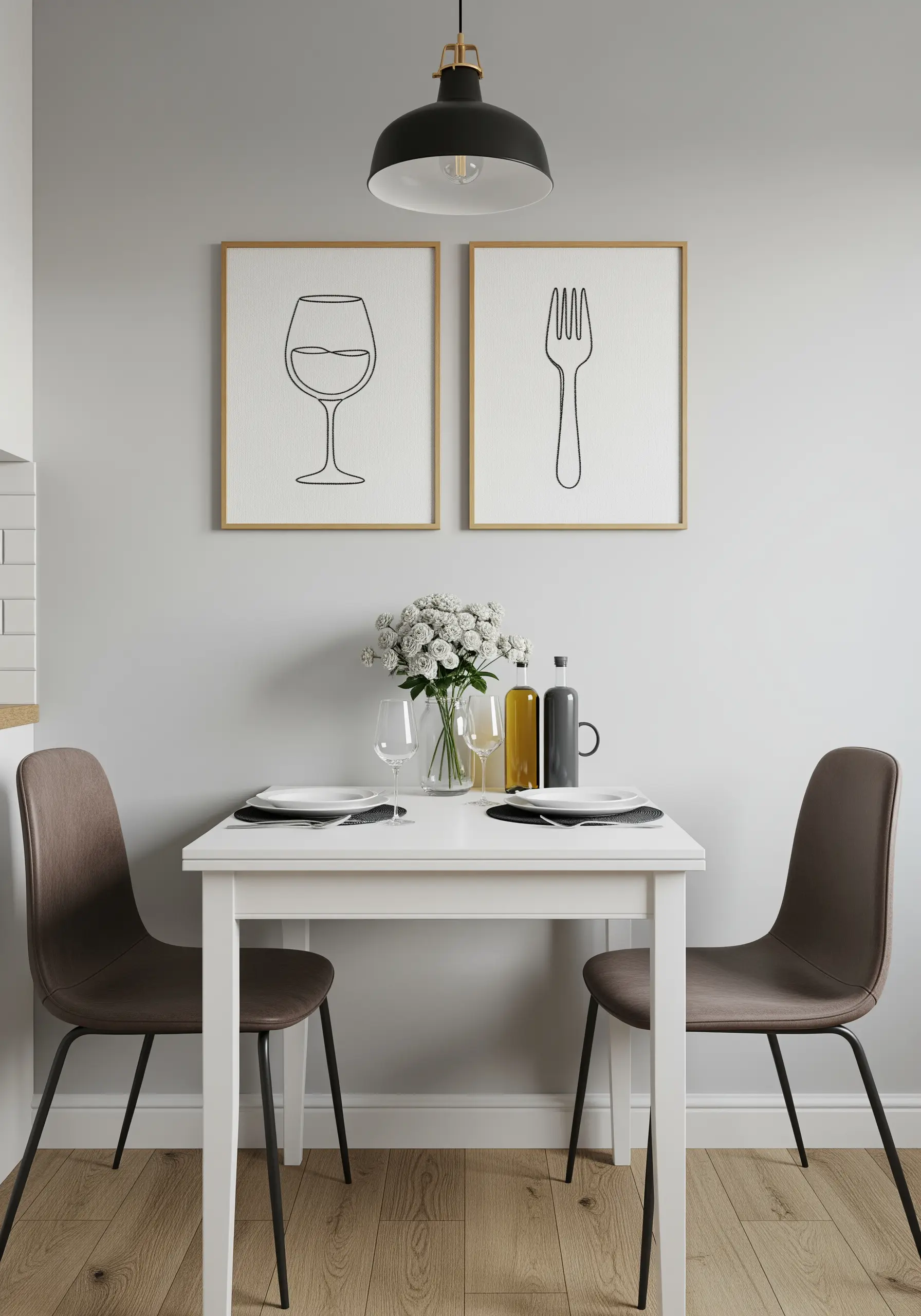 Two framed line-art embroideries, one of a wine glass and one of a fork, on a dining room wall.