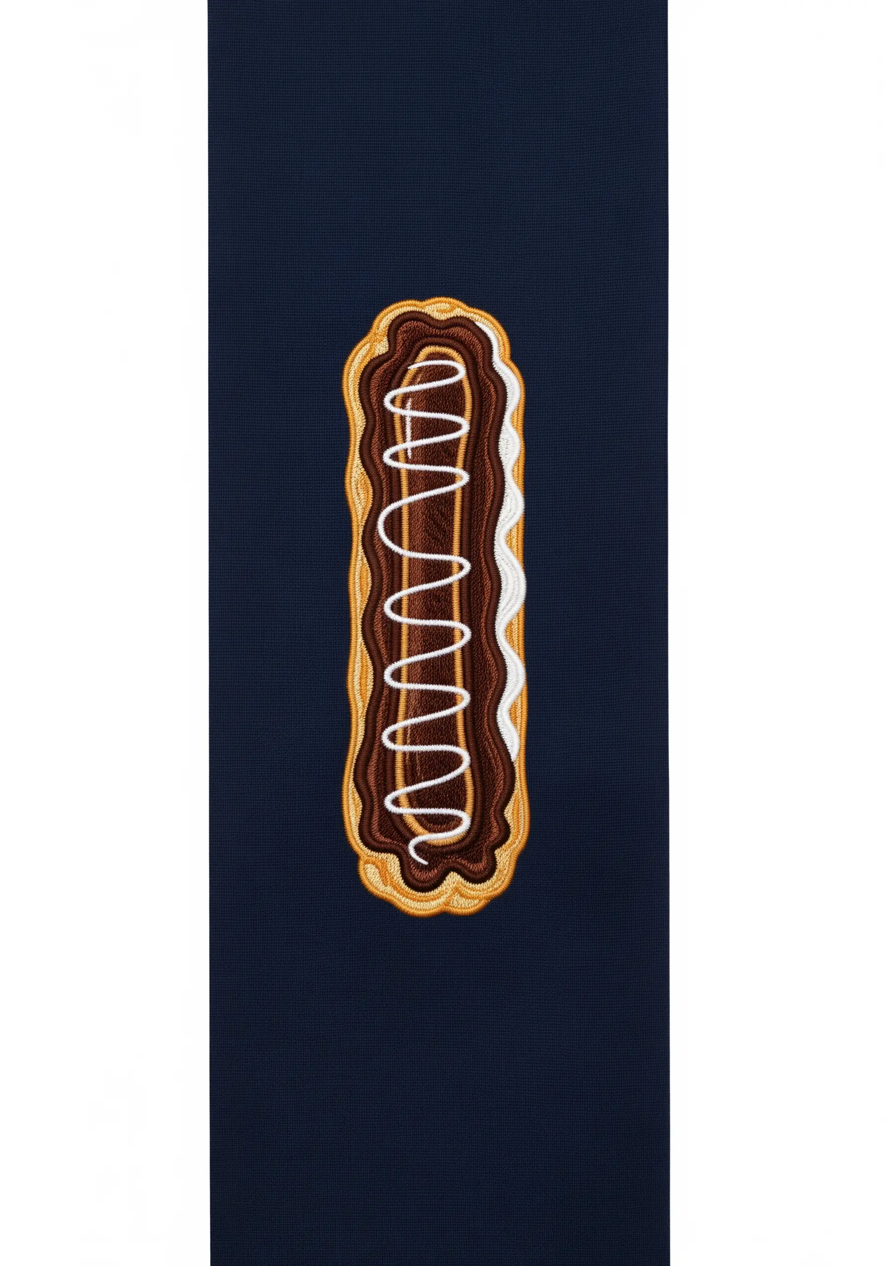 A realistic embroidered chocolate eclair with shiny ganache and fluffy cream.