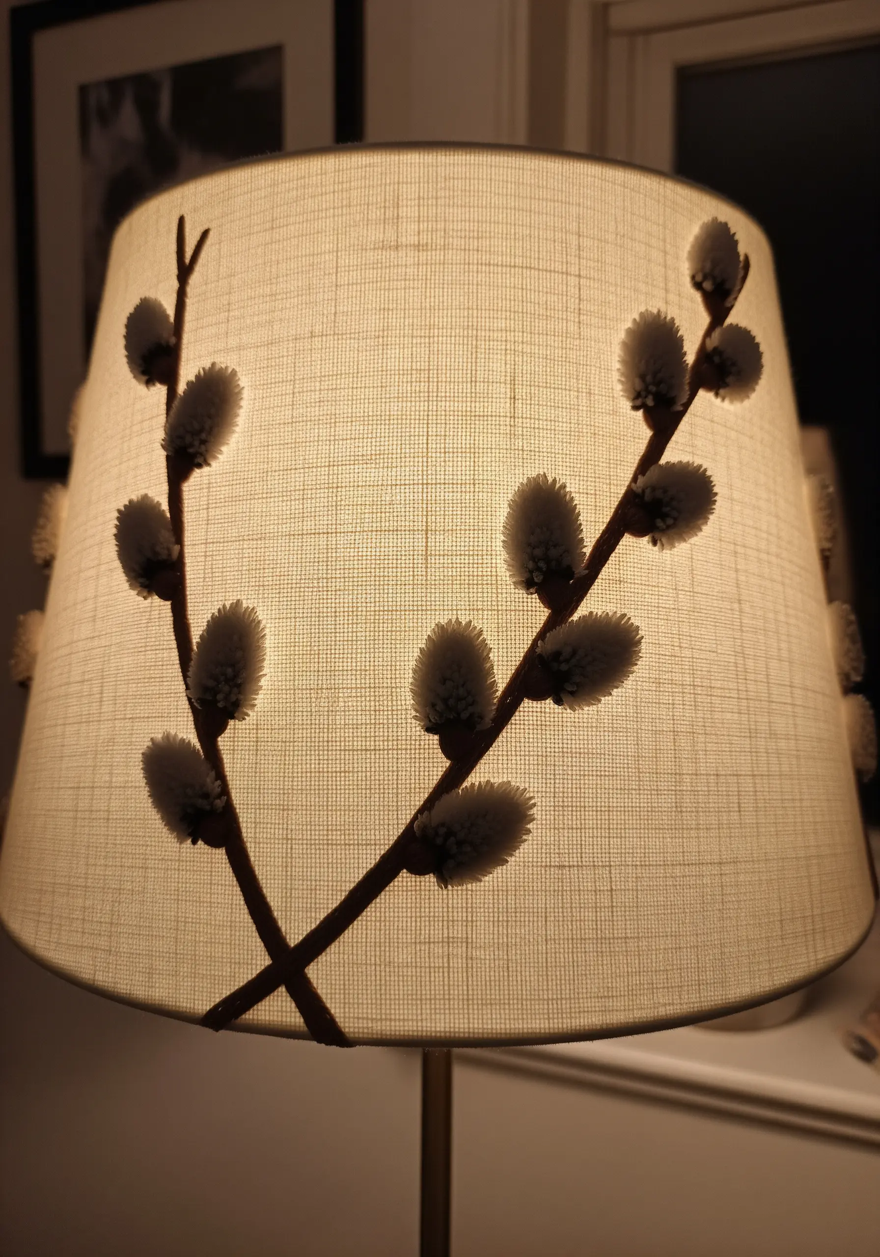 A lampshade embellished with embroidered pussy willow branches with 3D fuzzy buds.