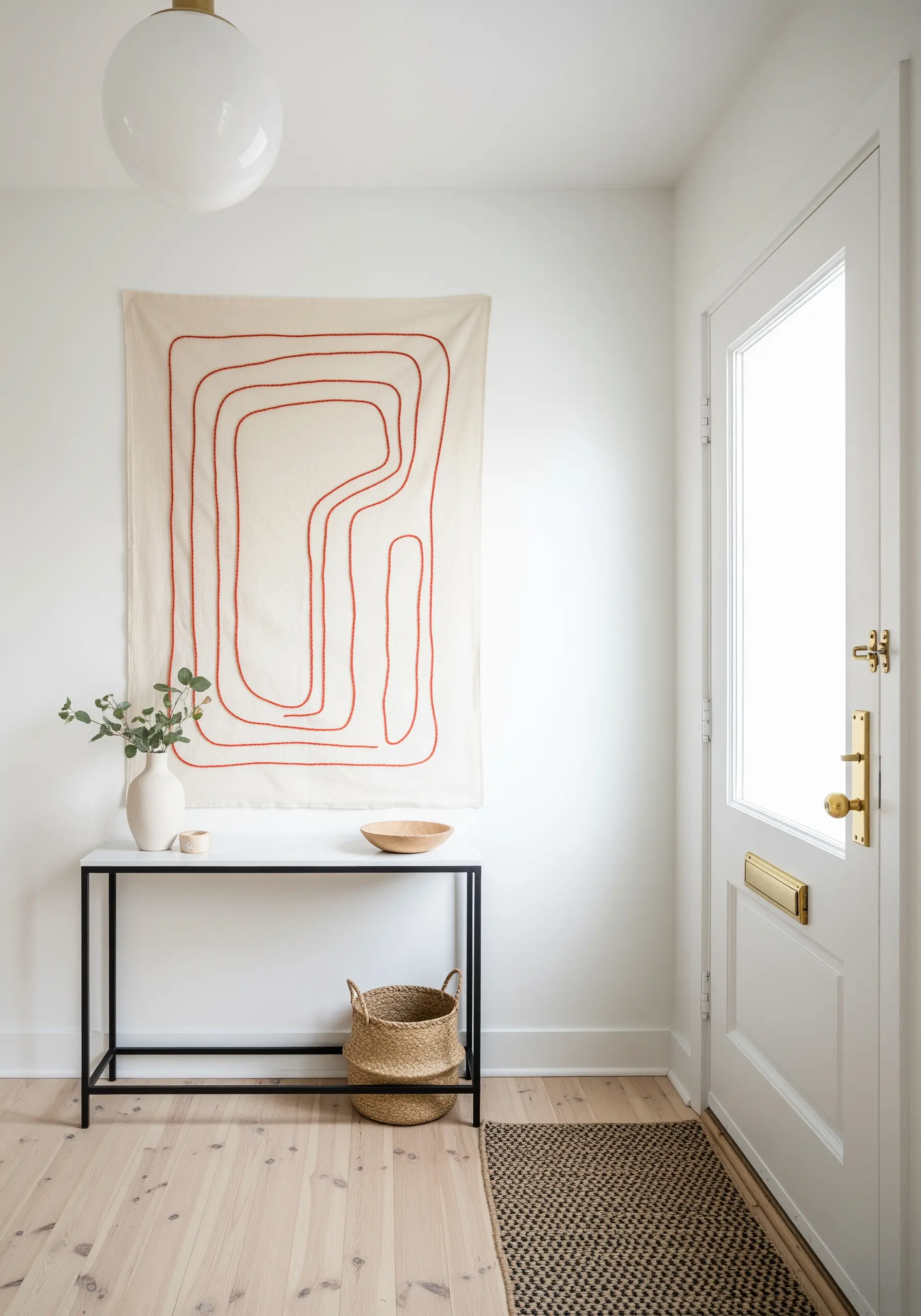 Large wall hanging with an abstract, continuous red line embroidered on off-white fabric