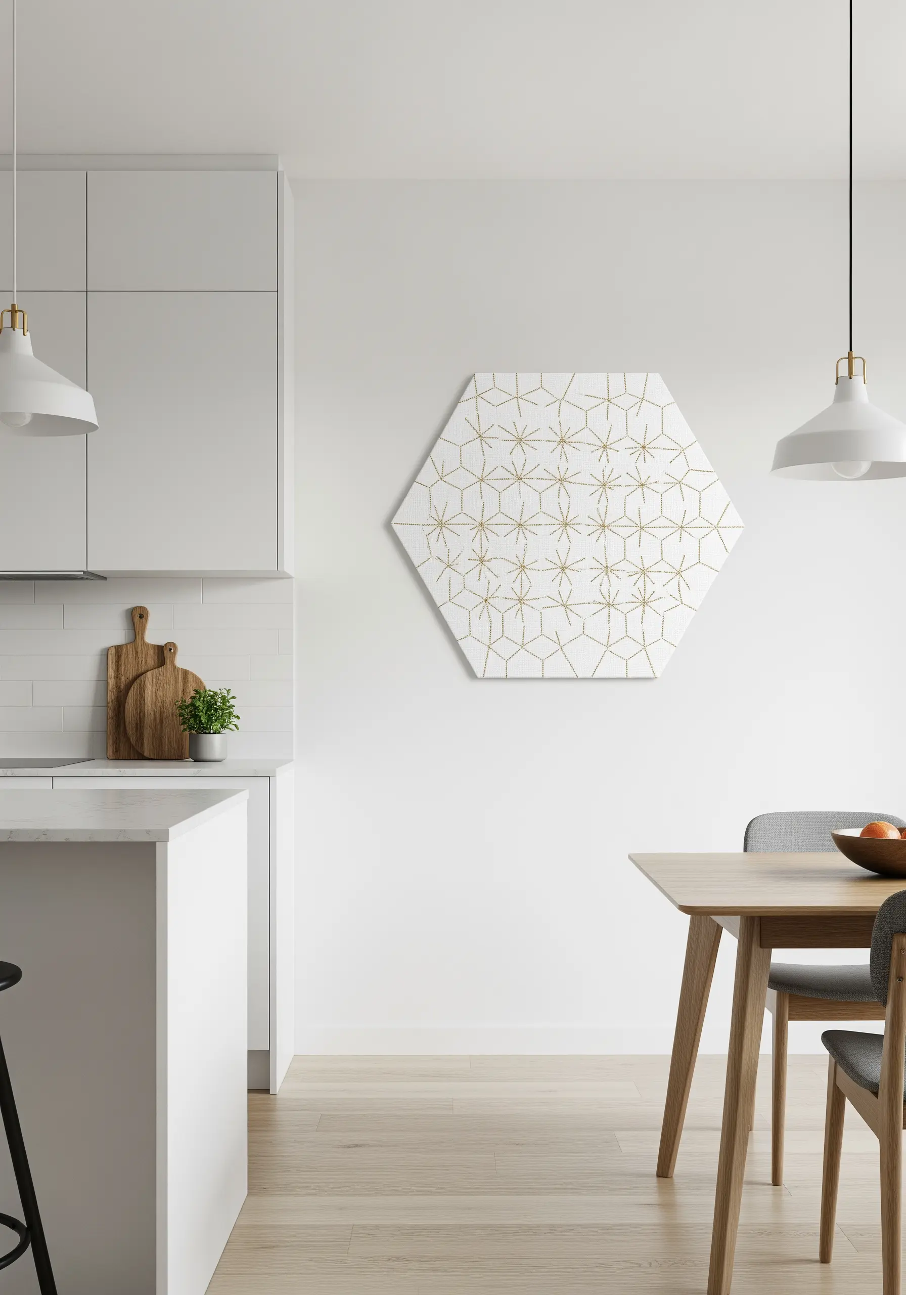 A hexagonal canvas with a geometric starburst pattern embroidered in gold thread.