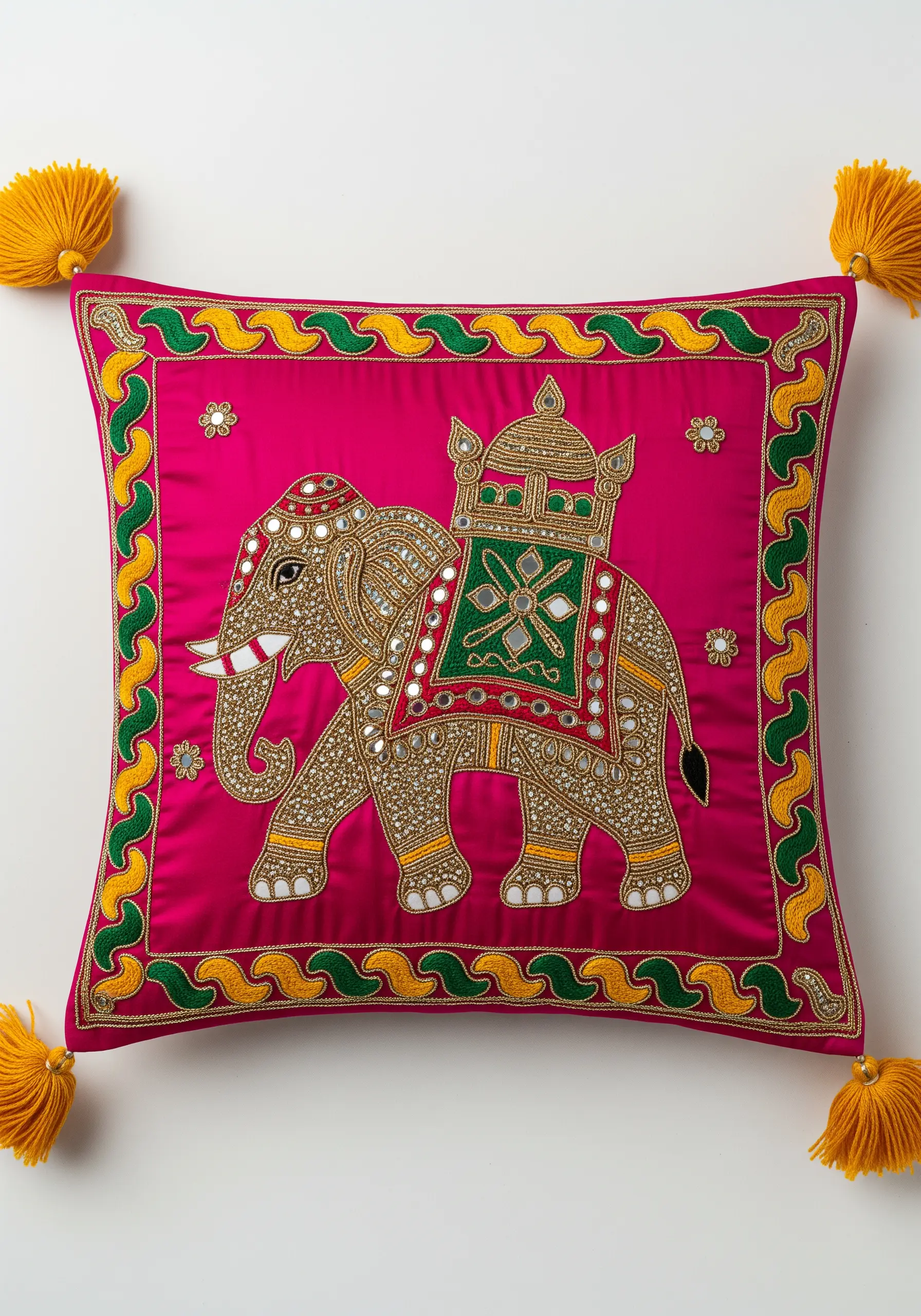 Indian Zardozi embroidery of an elephant with Shisha mirror work on a pink cushion