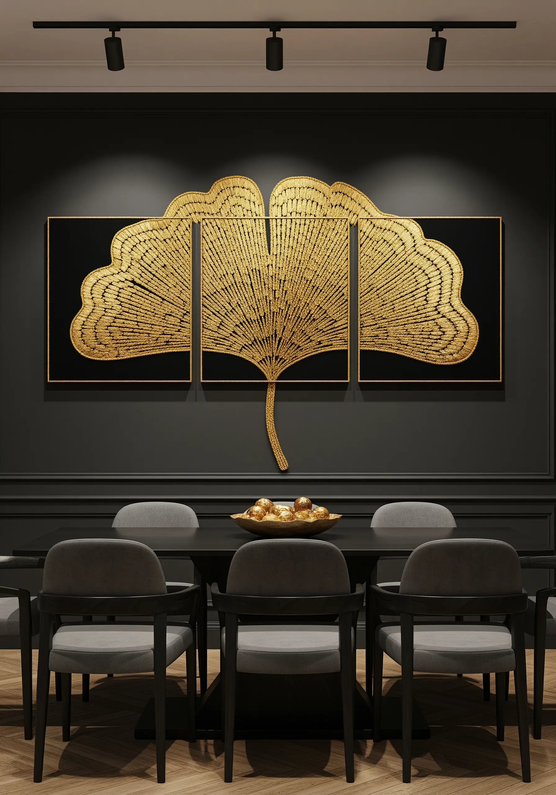 A three-panel embroidered ginkgo leaf in gold thread on a black background in a dining room.