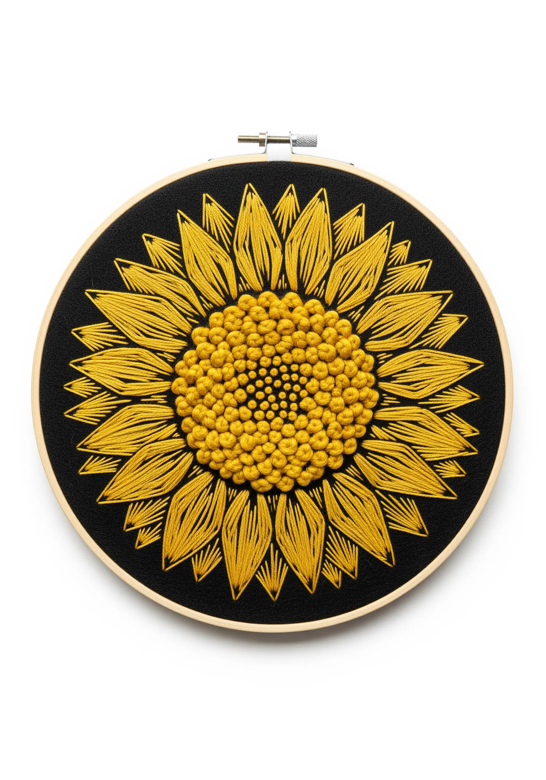 Bright yellow sunflower with textured French knot center on black fabric.