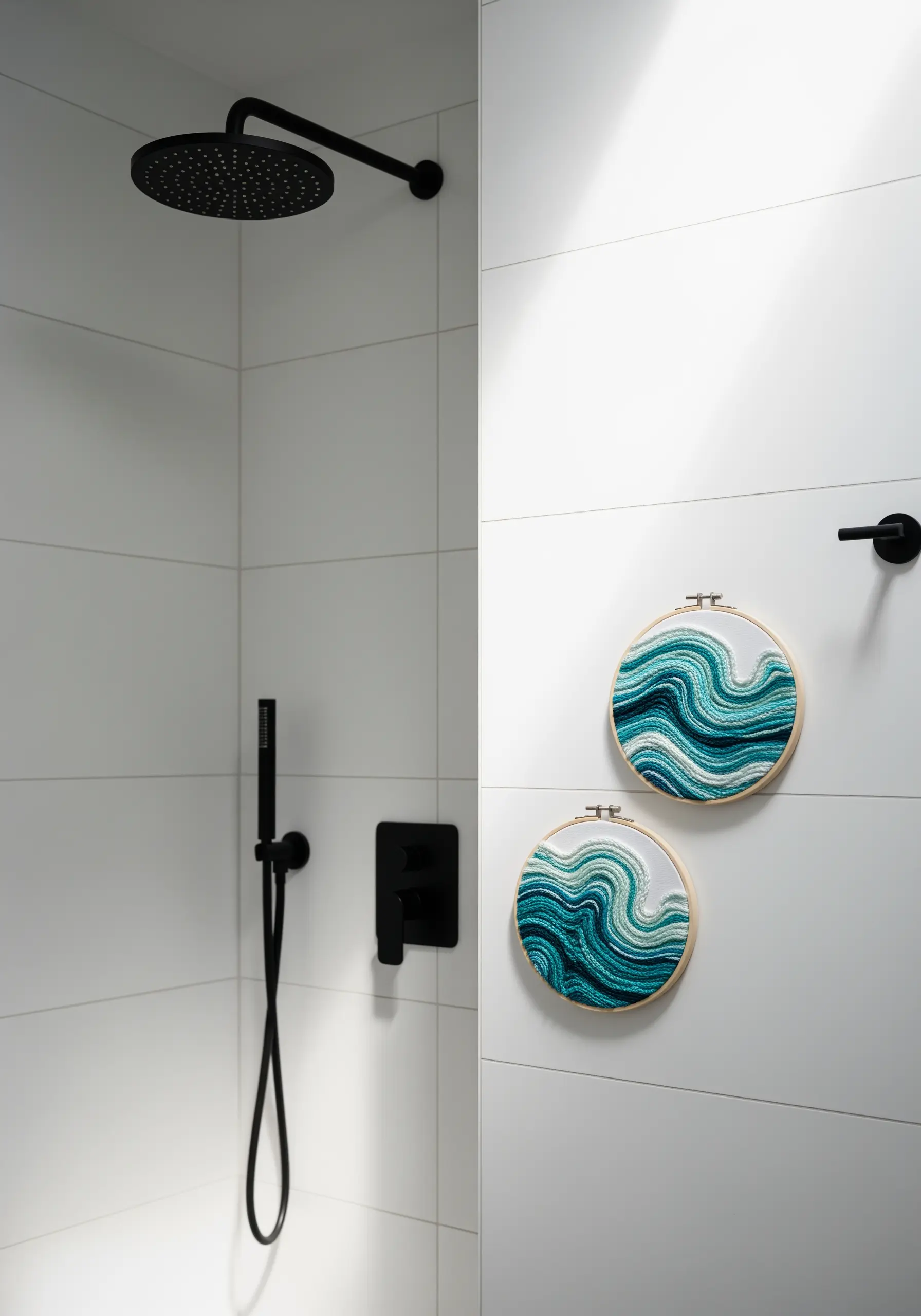 Abstract embroidered ocean waves in shades of teal, green, and white.