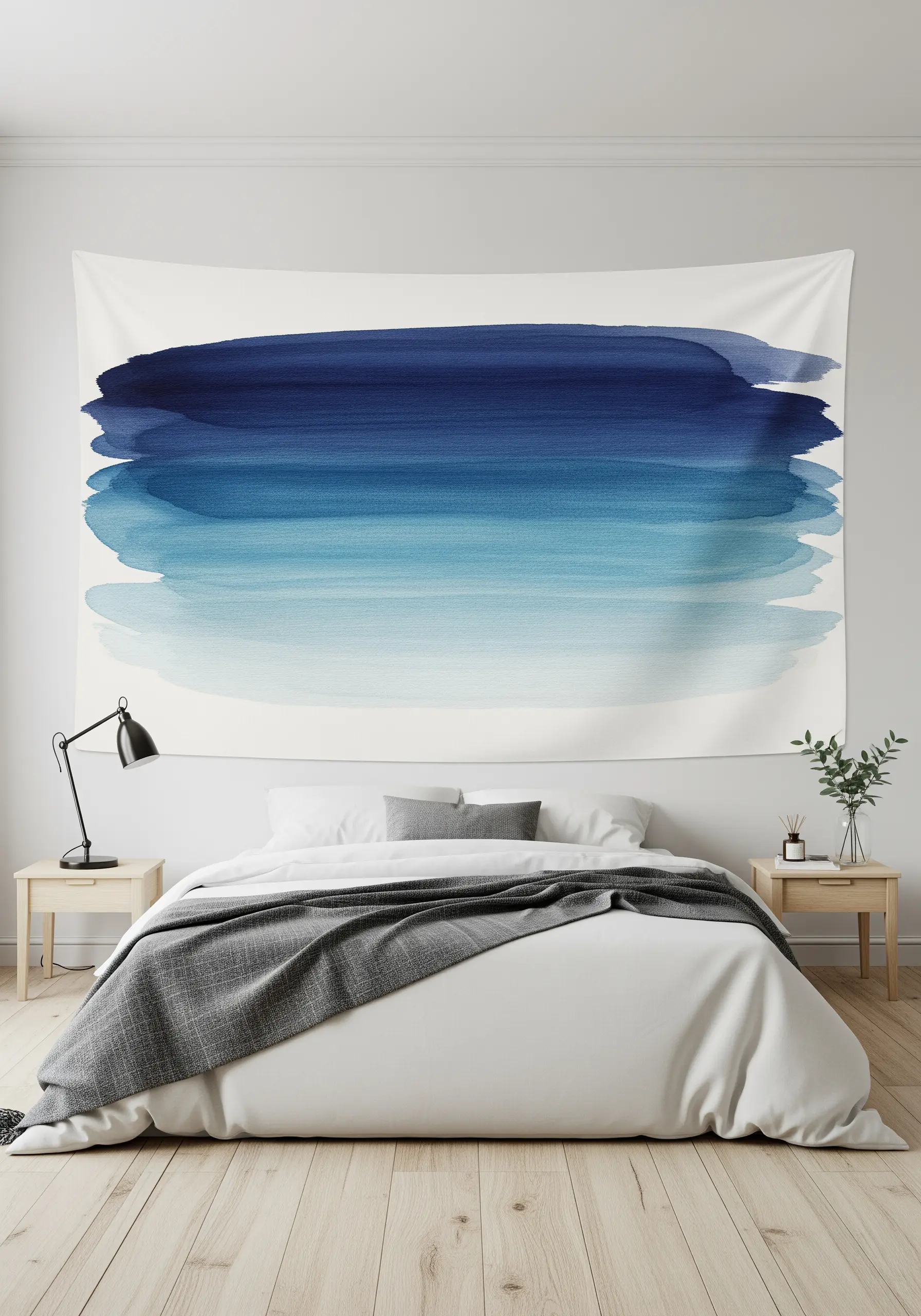 A large wall tapestry with an abstract horizontal watercolor wash in shades of blue.