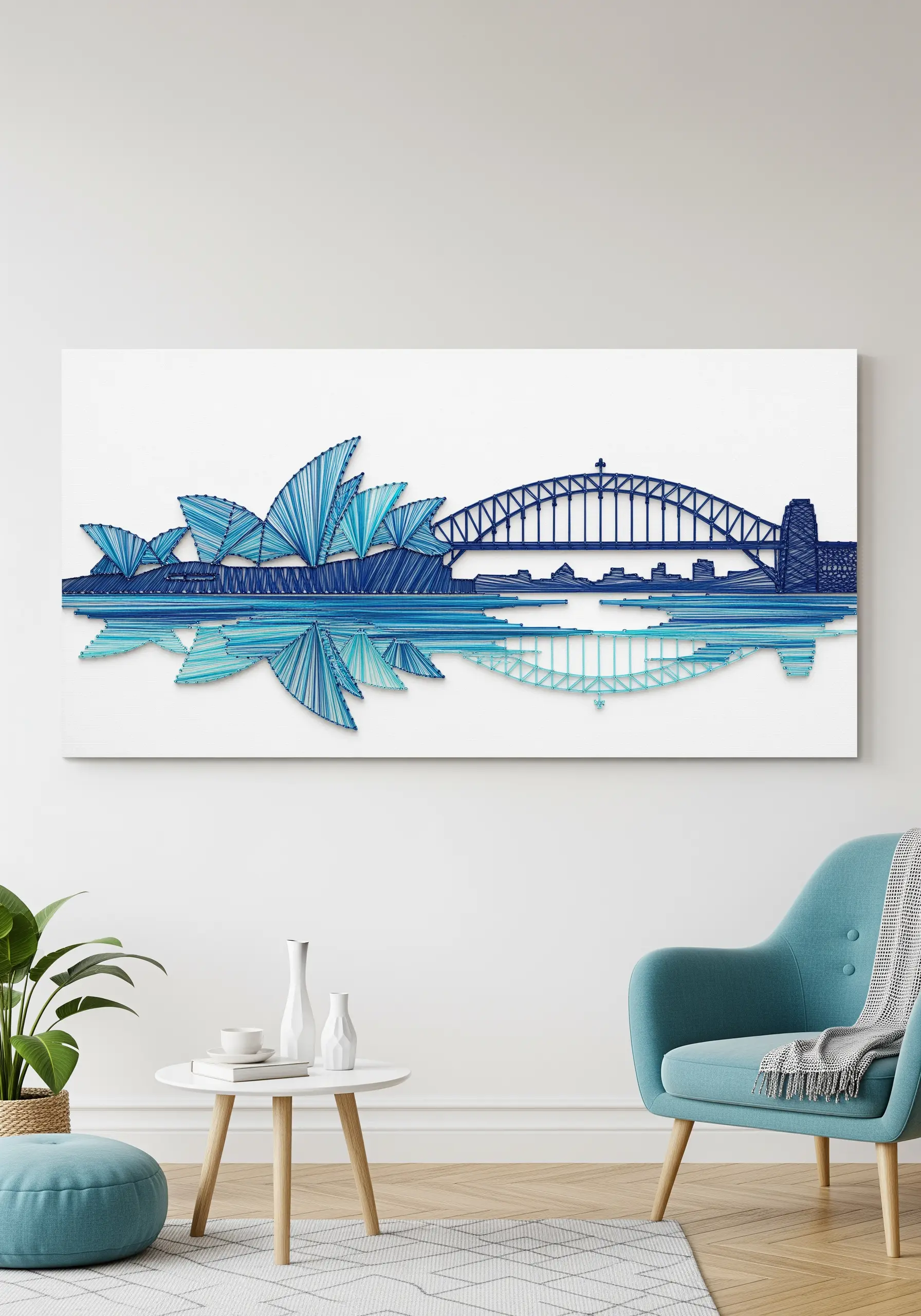Sydney skyline string art in shades of blue on a white canvas, with stitched water reflections.