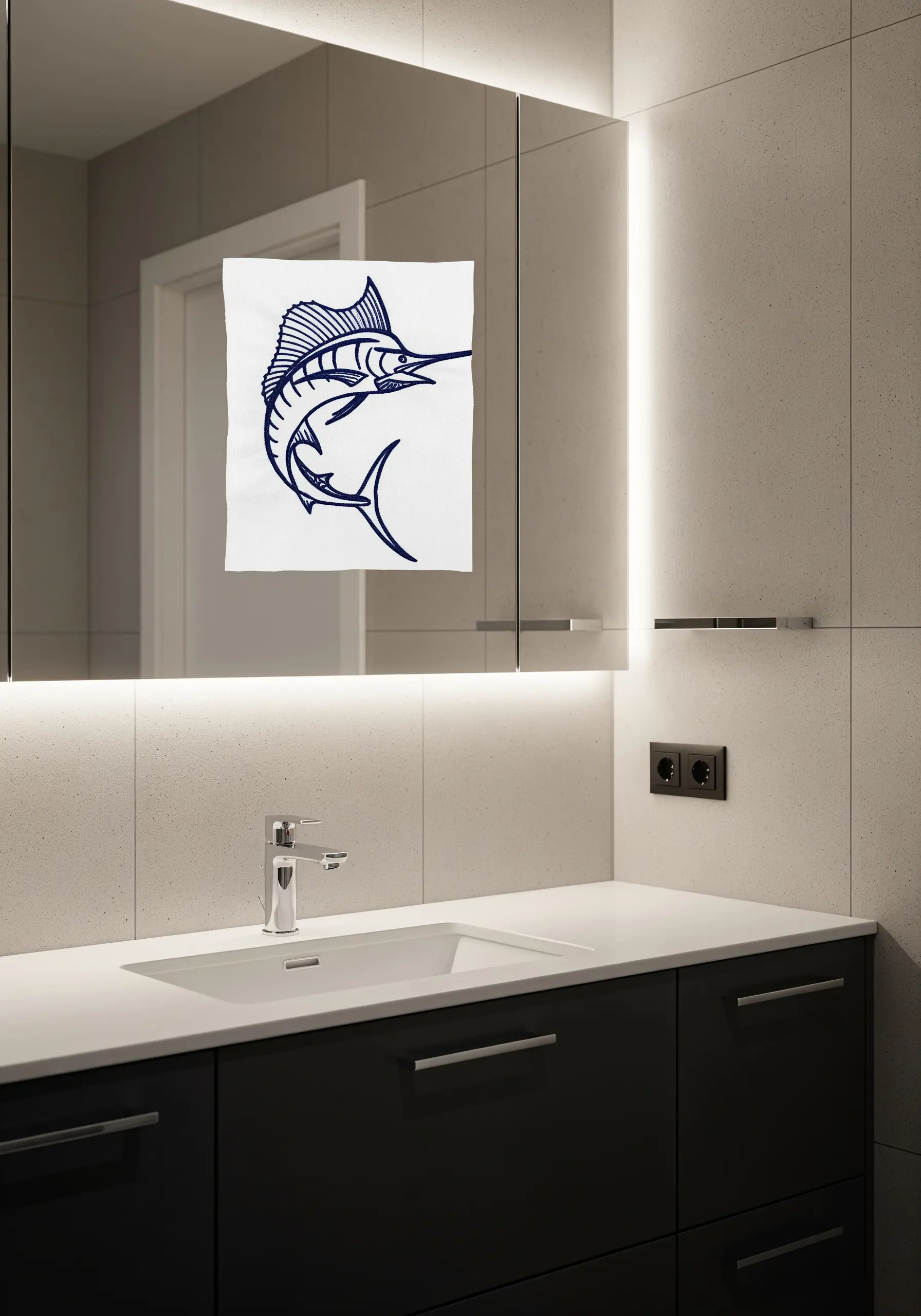 A simple line art embroidery of a marlin on a white towel.