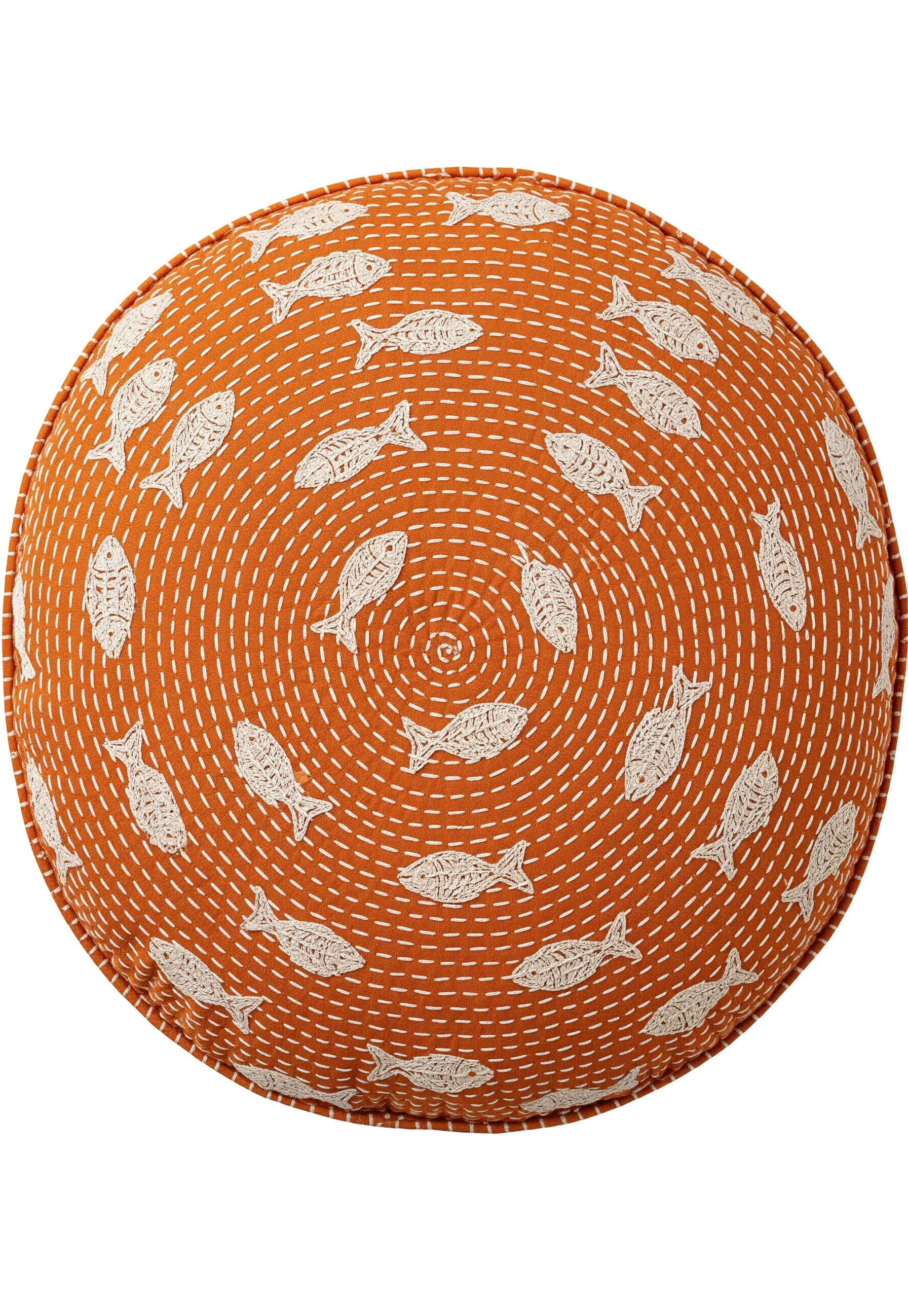 A round orange cushion with a background of spiral running stitch and fish motifs
