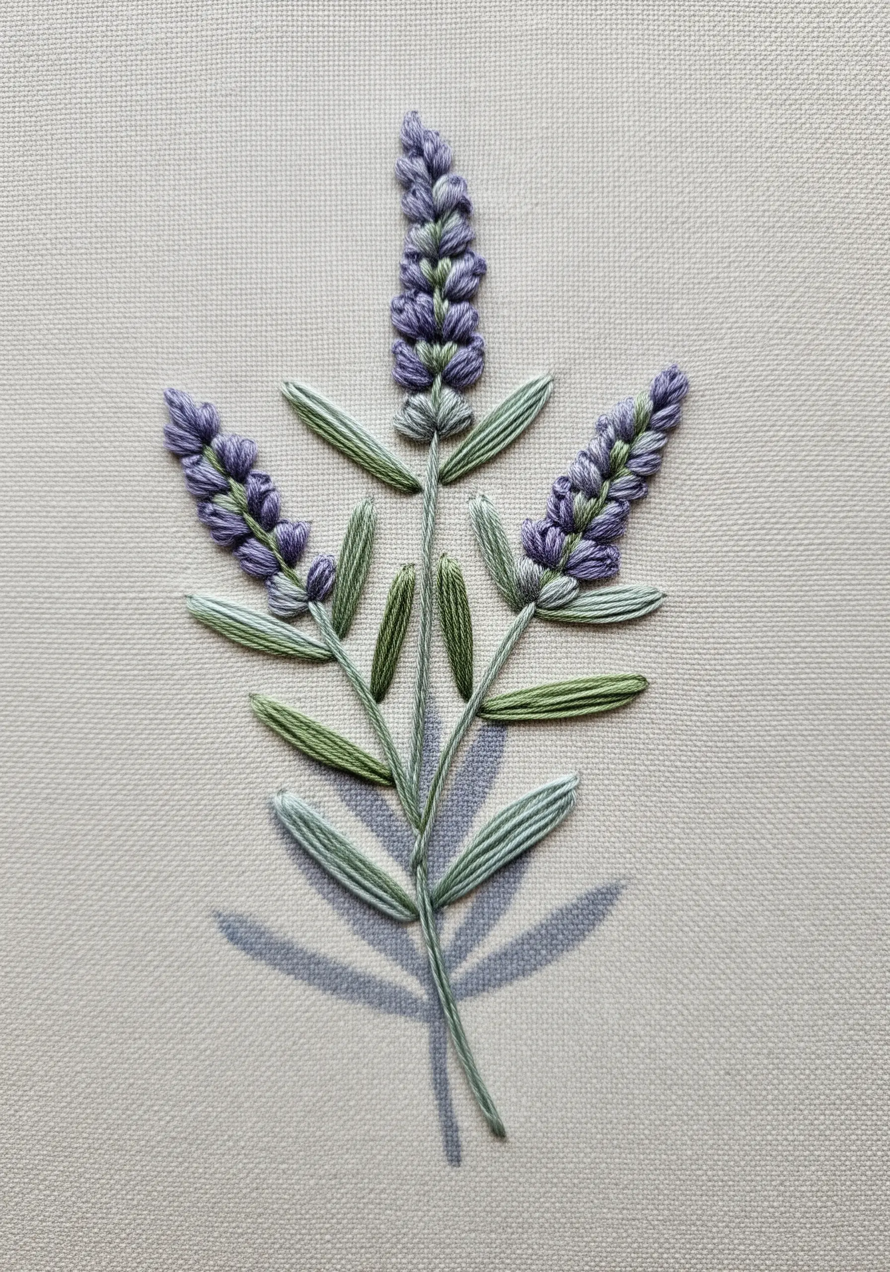 Delicate lavender sprigs with a light shadow stitched in a finer thread.
