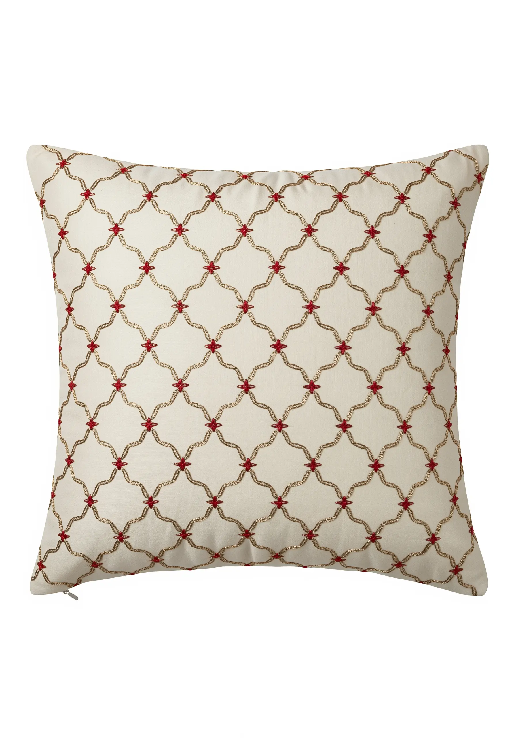 A gold and red trellis pattern embroidered on a cream-colored cushion