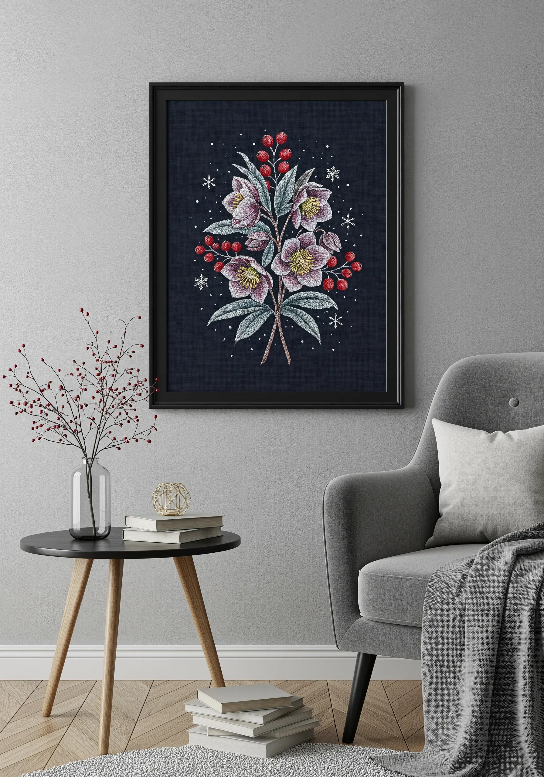 Framed embroidery of a winter floral arrangement with hellebores, red berries, and snowflakes.