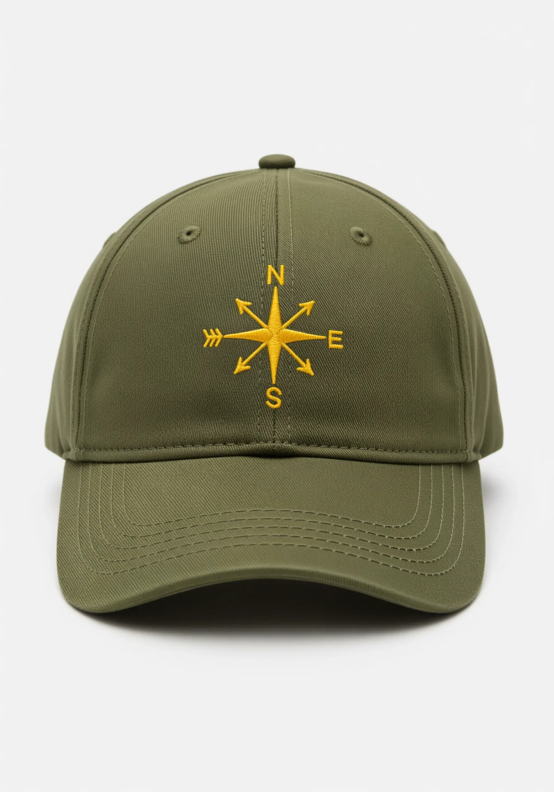 A clean, yellow-gold embroidered compass rose on the front of an olive green baseball cap.