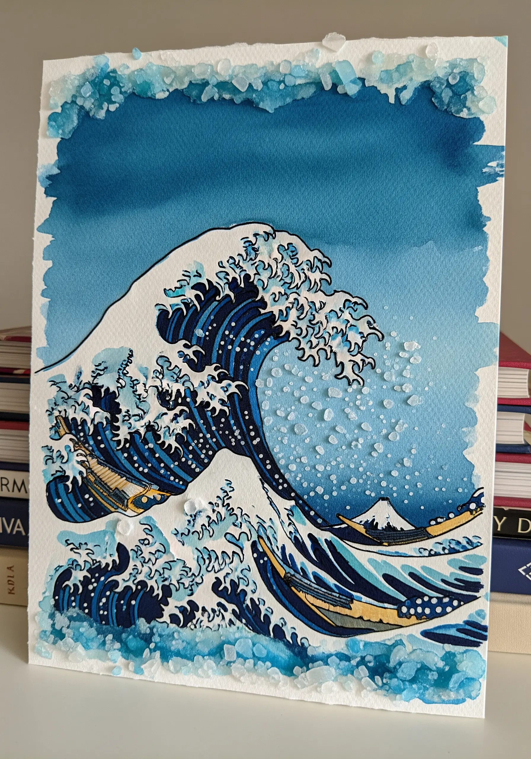 The Great Wave embroidery on watercolor paper embellished with salt crystals for texture.