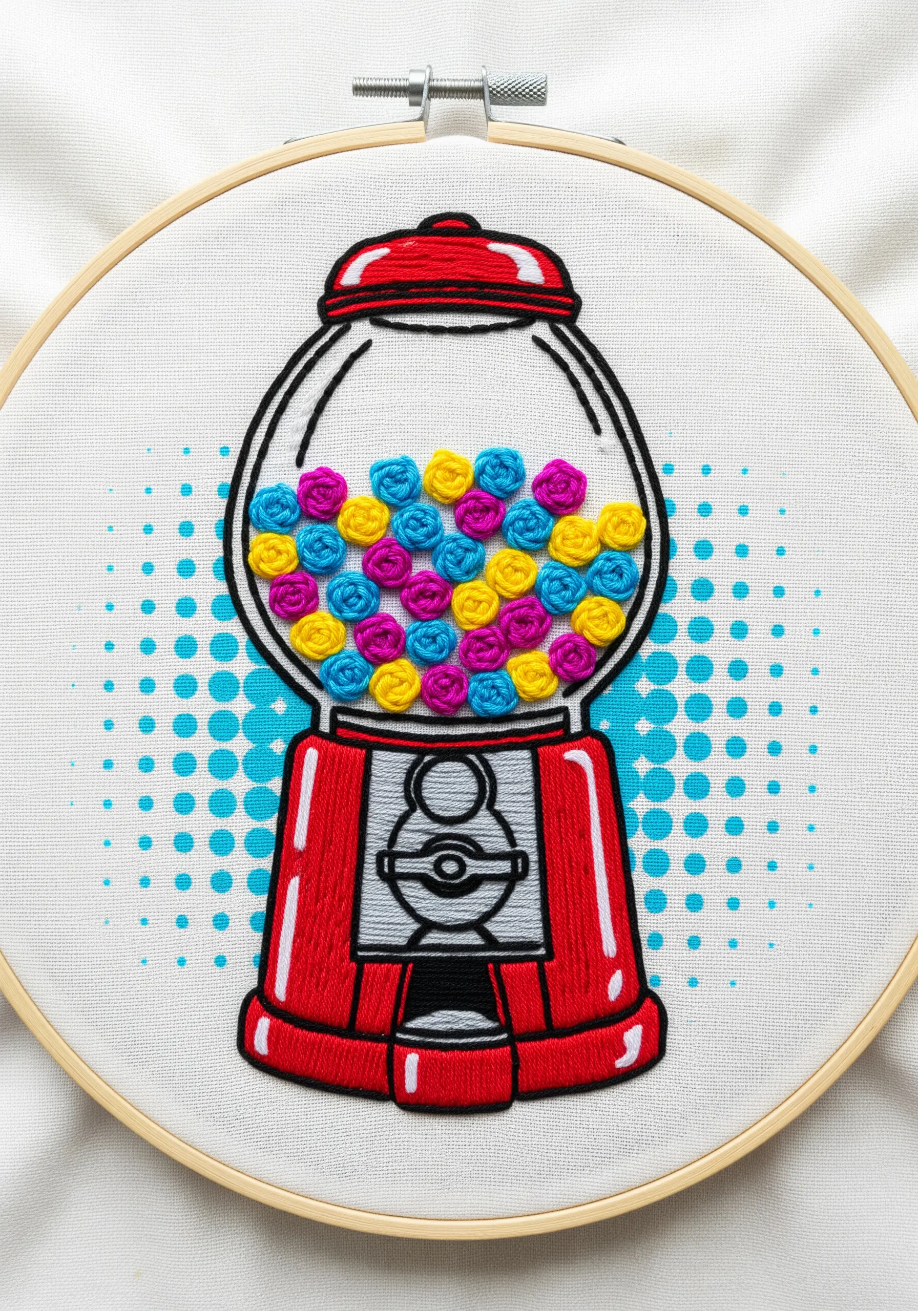 Pop-art gumball machine embroidery with 3D woven wheel stitches for gumballs.
