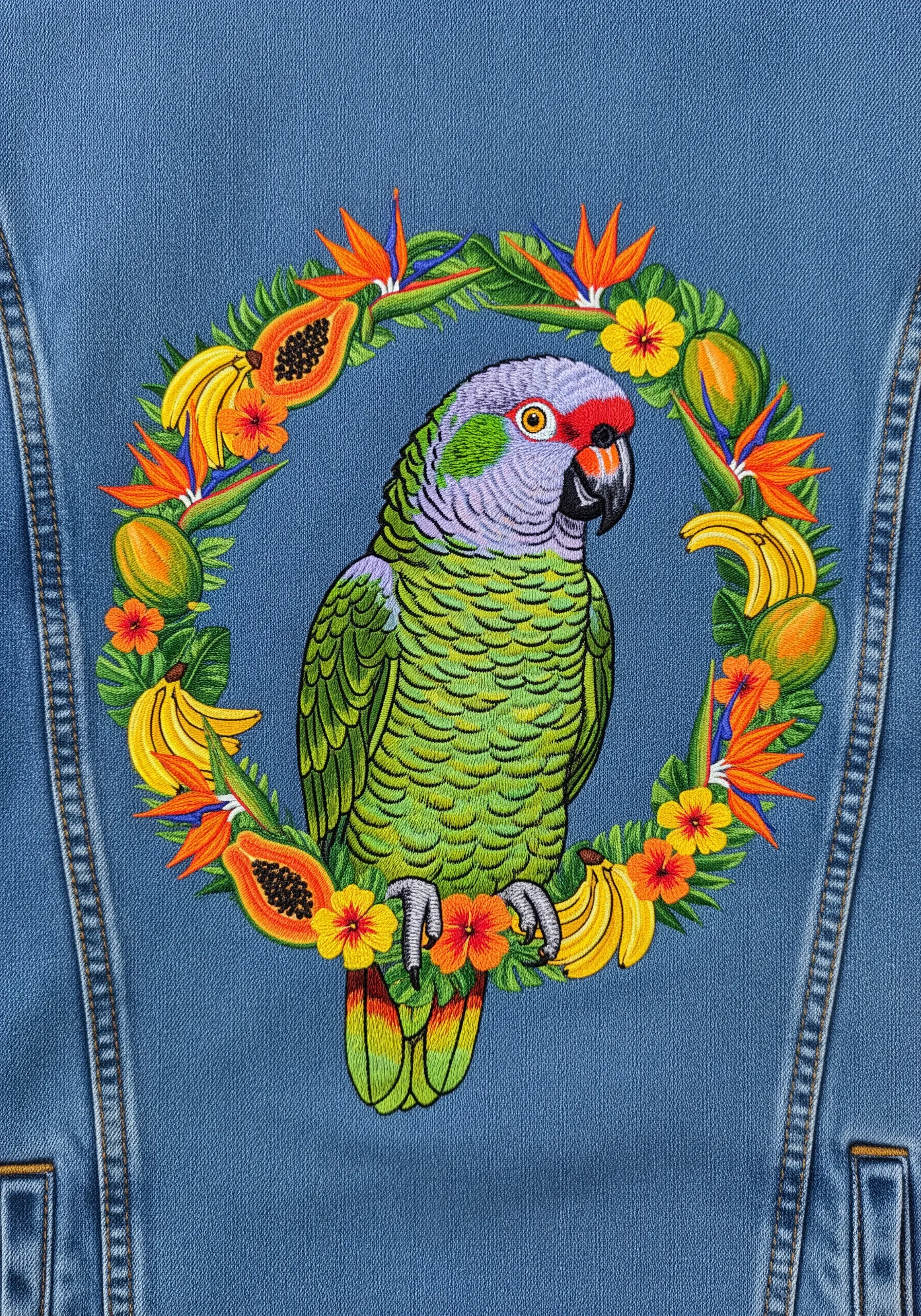 An Amazon parrot centered within a round wreath of tropical fruits and flowers.