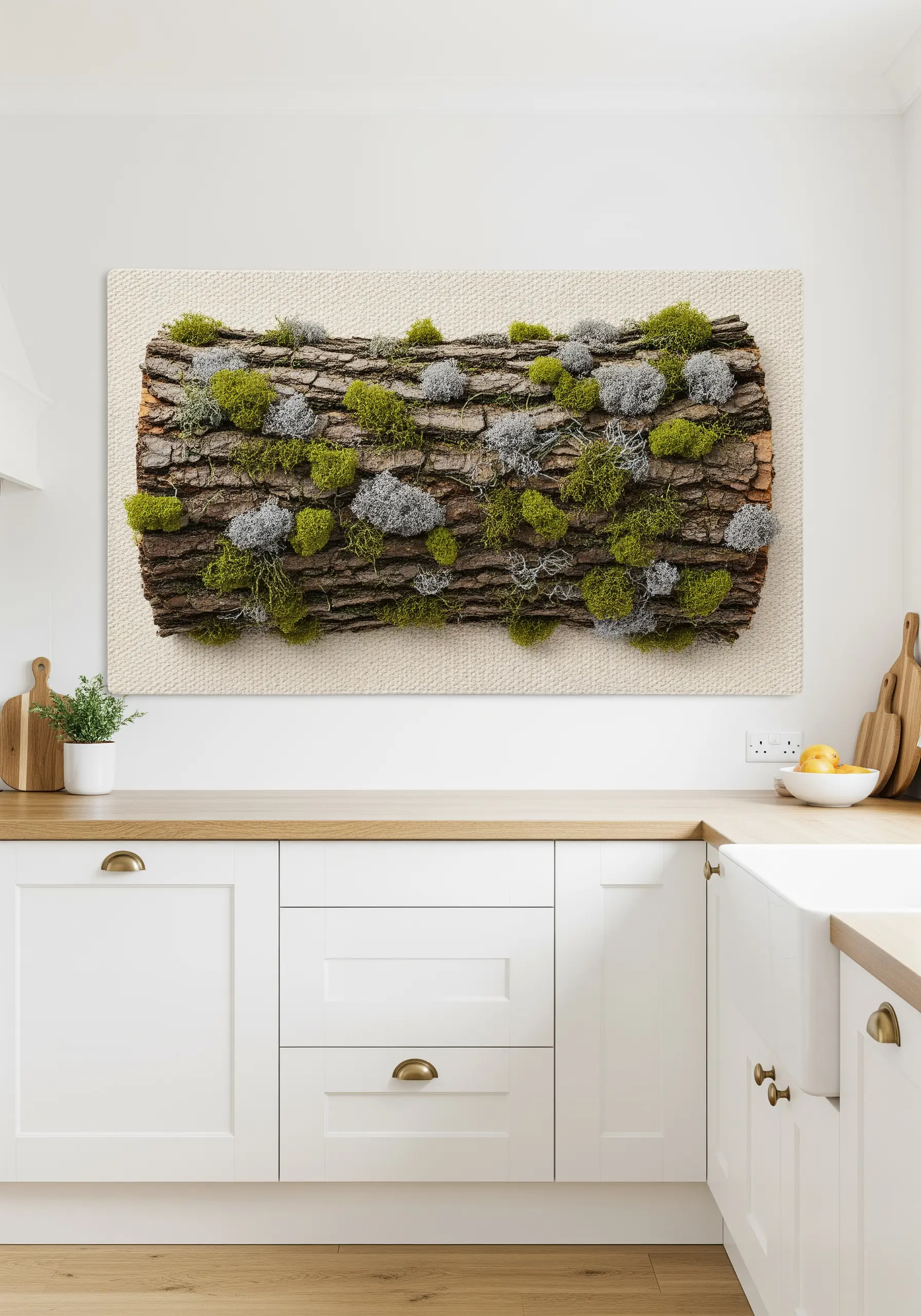 A highly realistic embroidered piece depicting moss and lichen growing on a log.