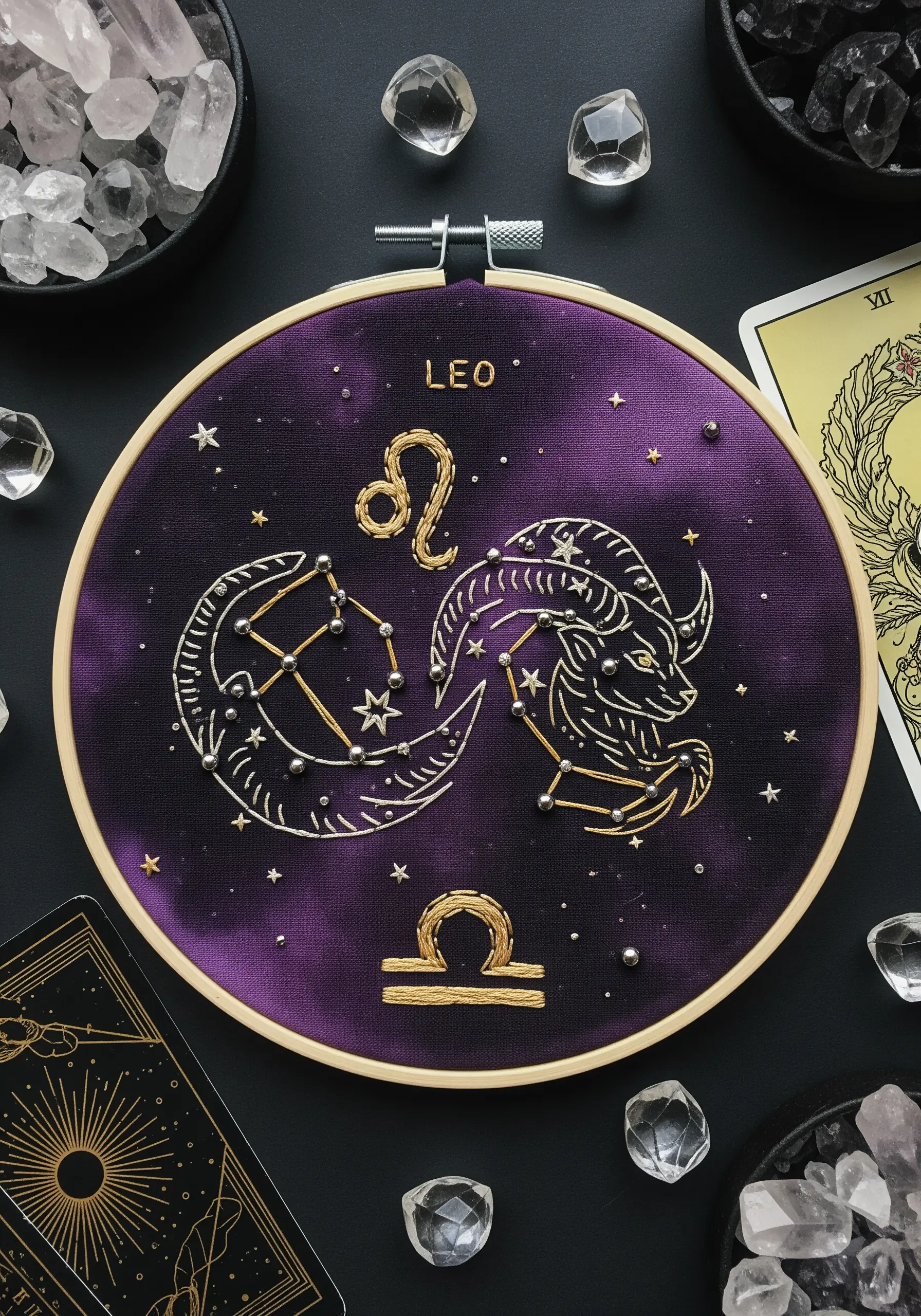 Embroidery of Leo and Libra zodiac symbols and constellations on purple fabric.