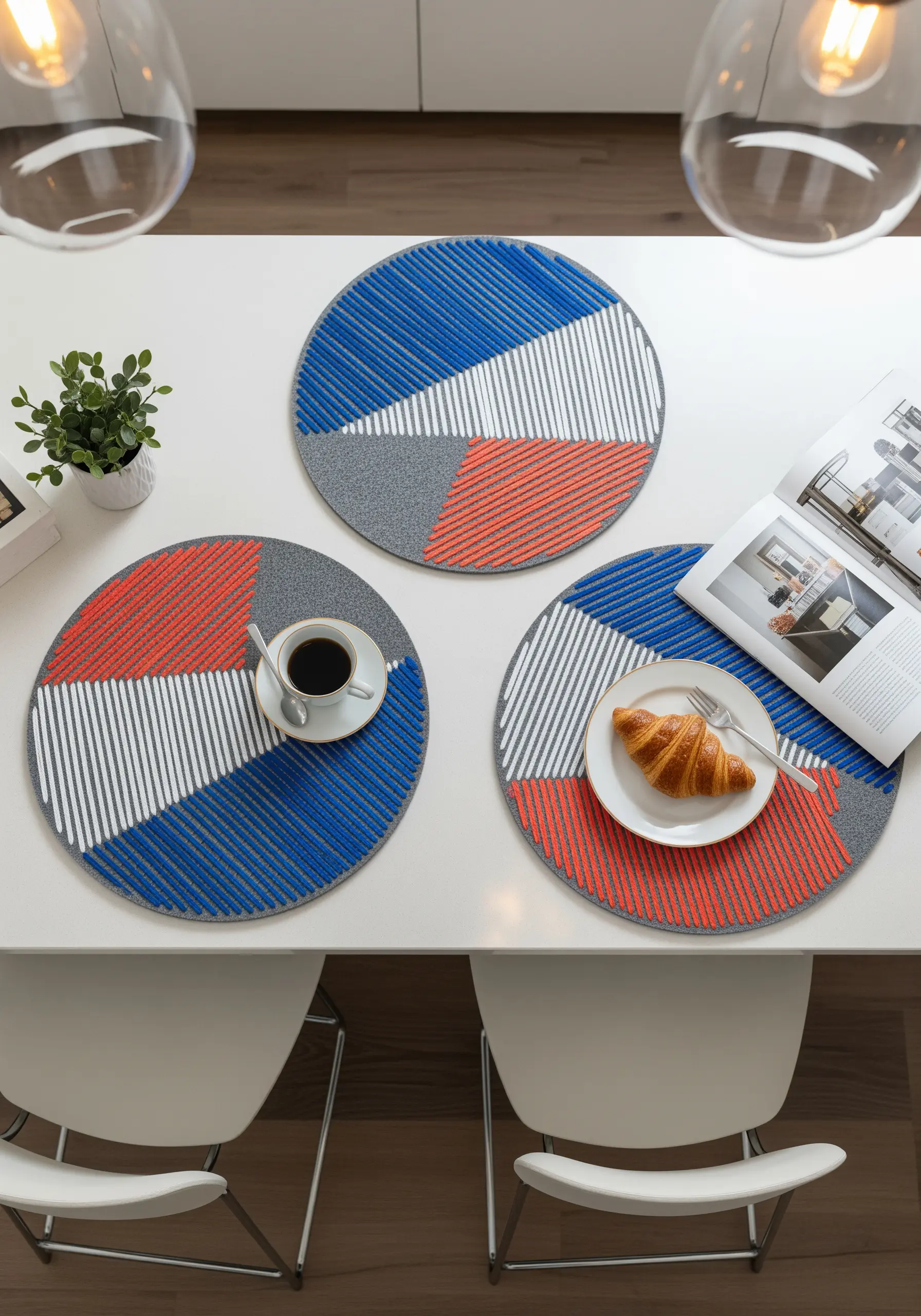 Round placemats with geometric color blocks in blue, red, gray, and white.