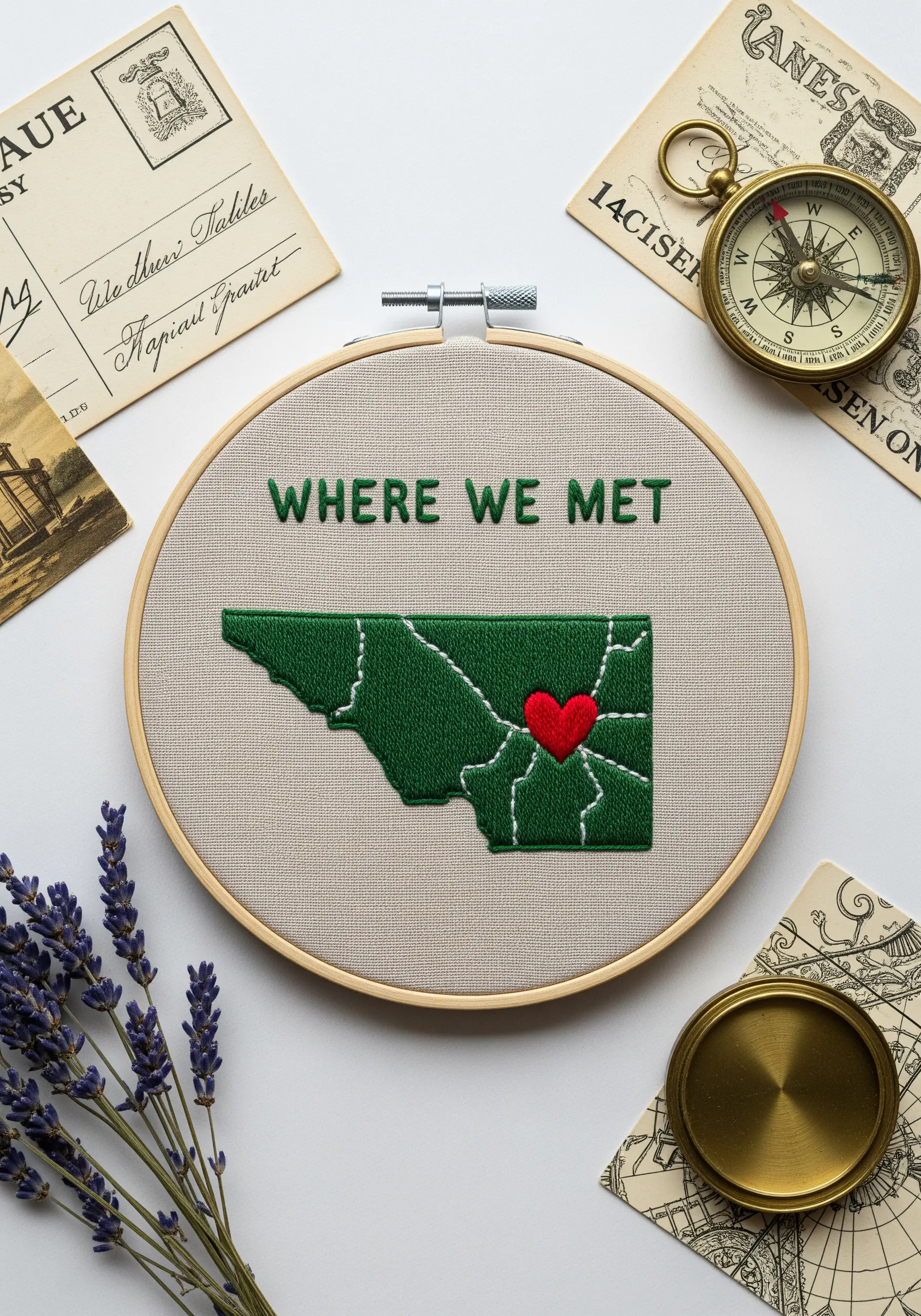 Embroidered map of a state with a red heart marking a location.