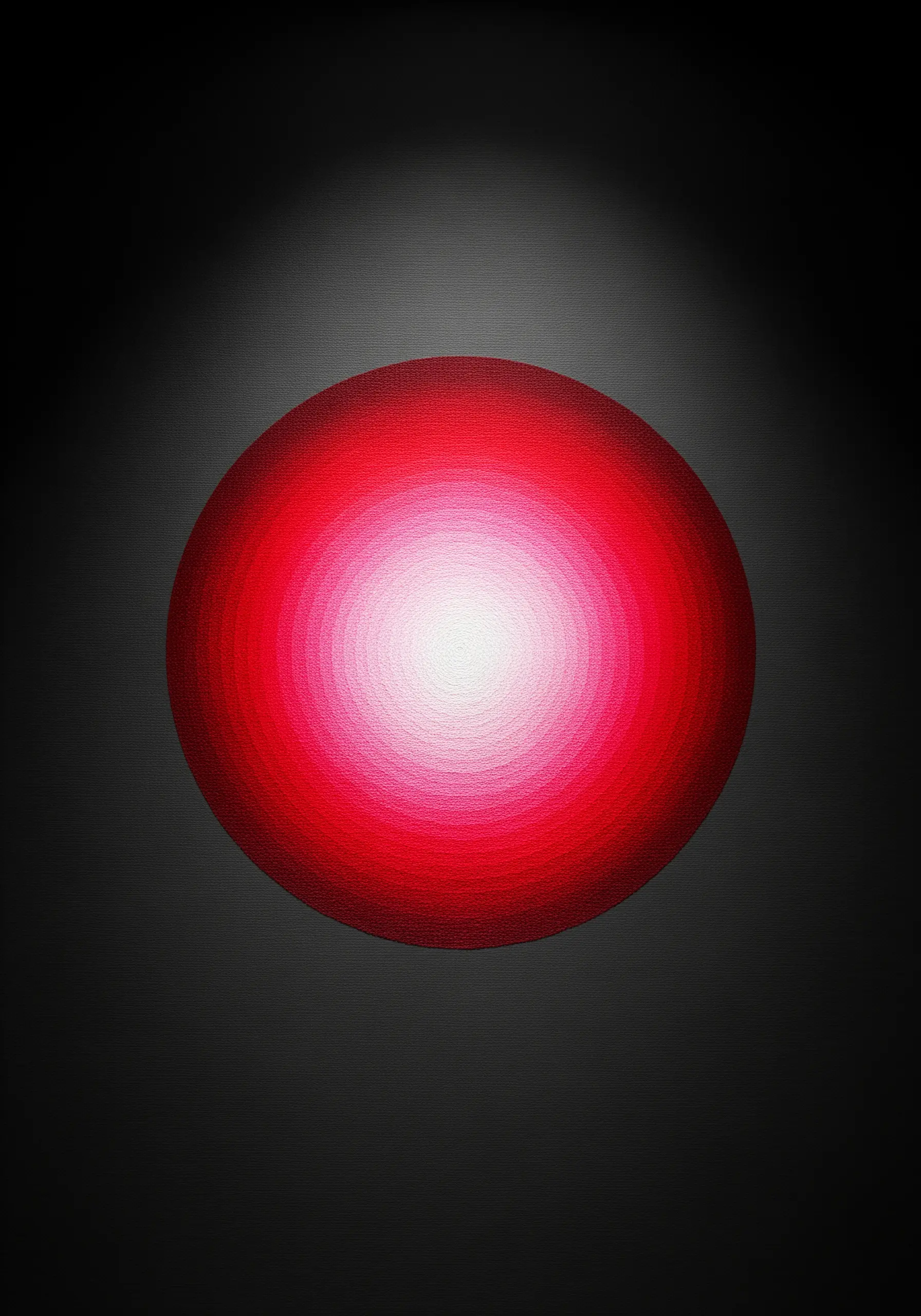 An embroidered red orb glowing from a white center on a black background.