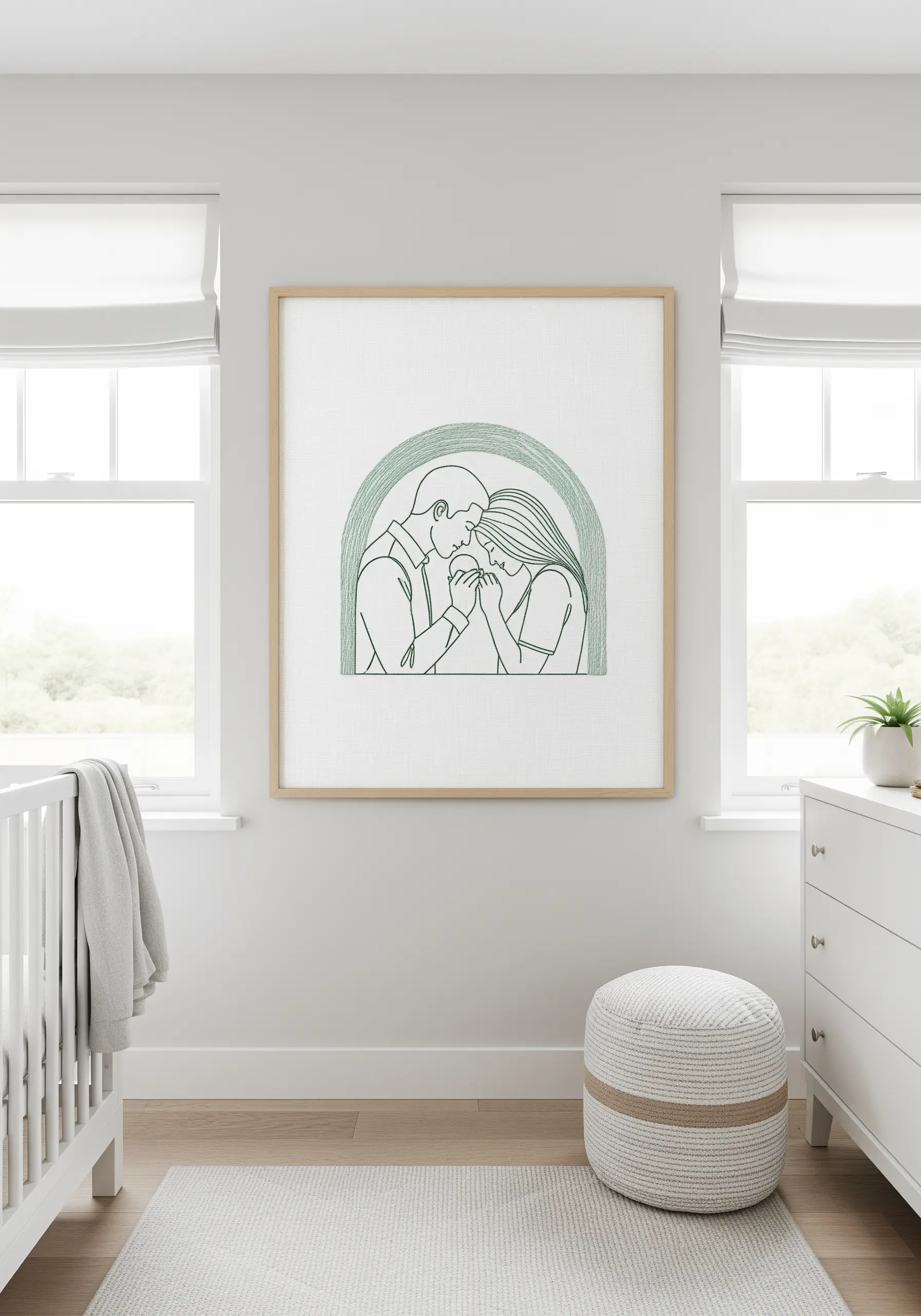 Line art embroidery of an embracing couple framed by a soft green stitched arch.