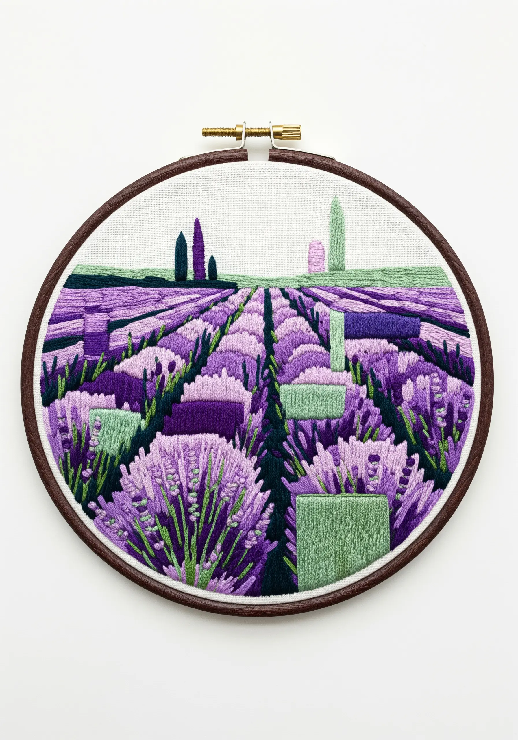 An abstract, geometric embroidery of a lavender field in an oval hoop.