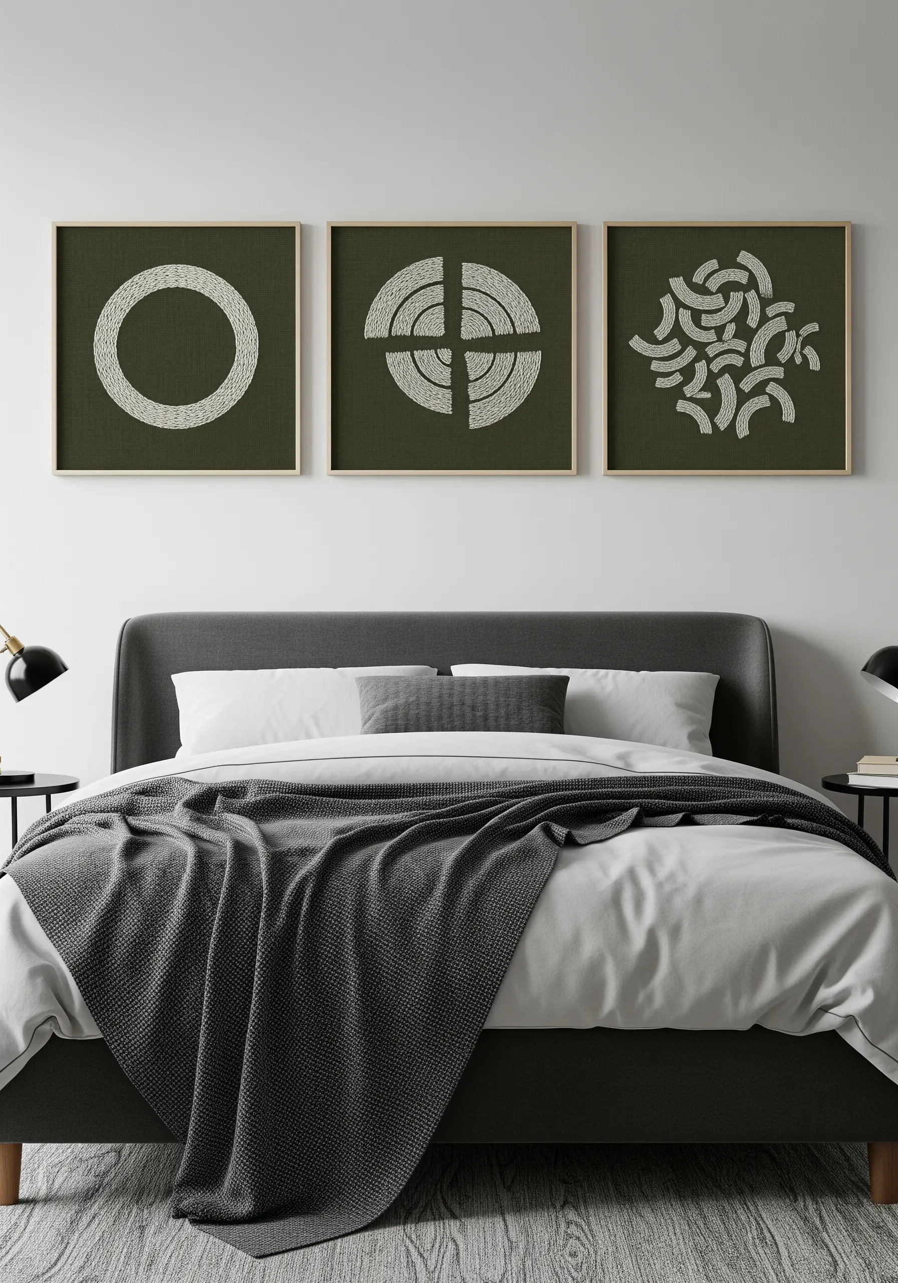 A triptych of framed embroidery showing a circle deconstructed into segments, stitched in white on green.