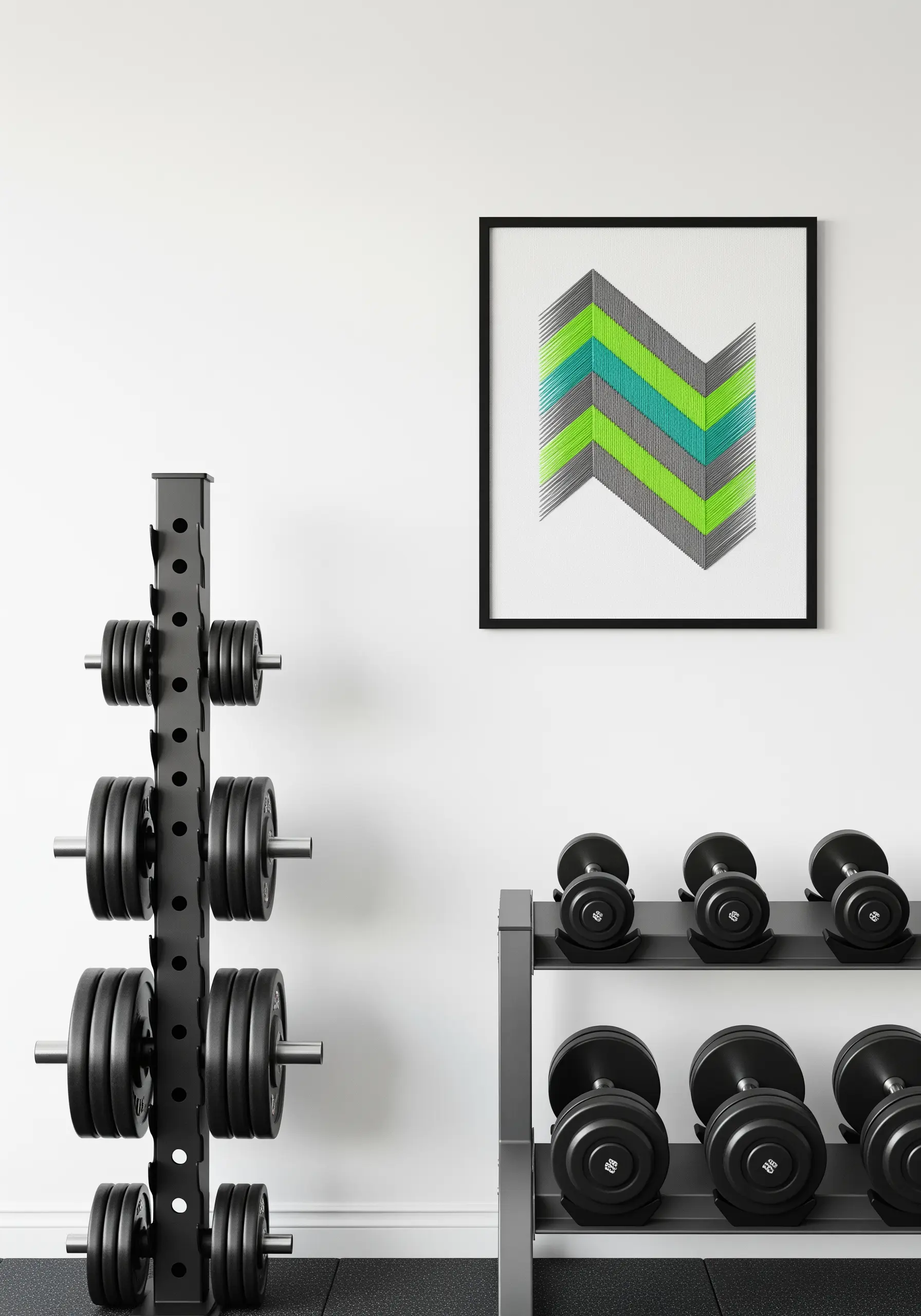 A framed embroidery of interlocking chevrons in green, teal, and grey.