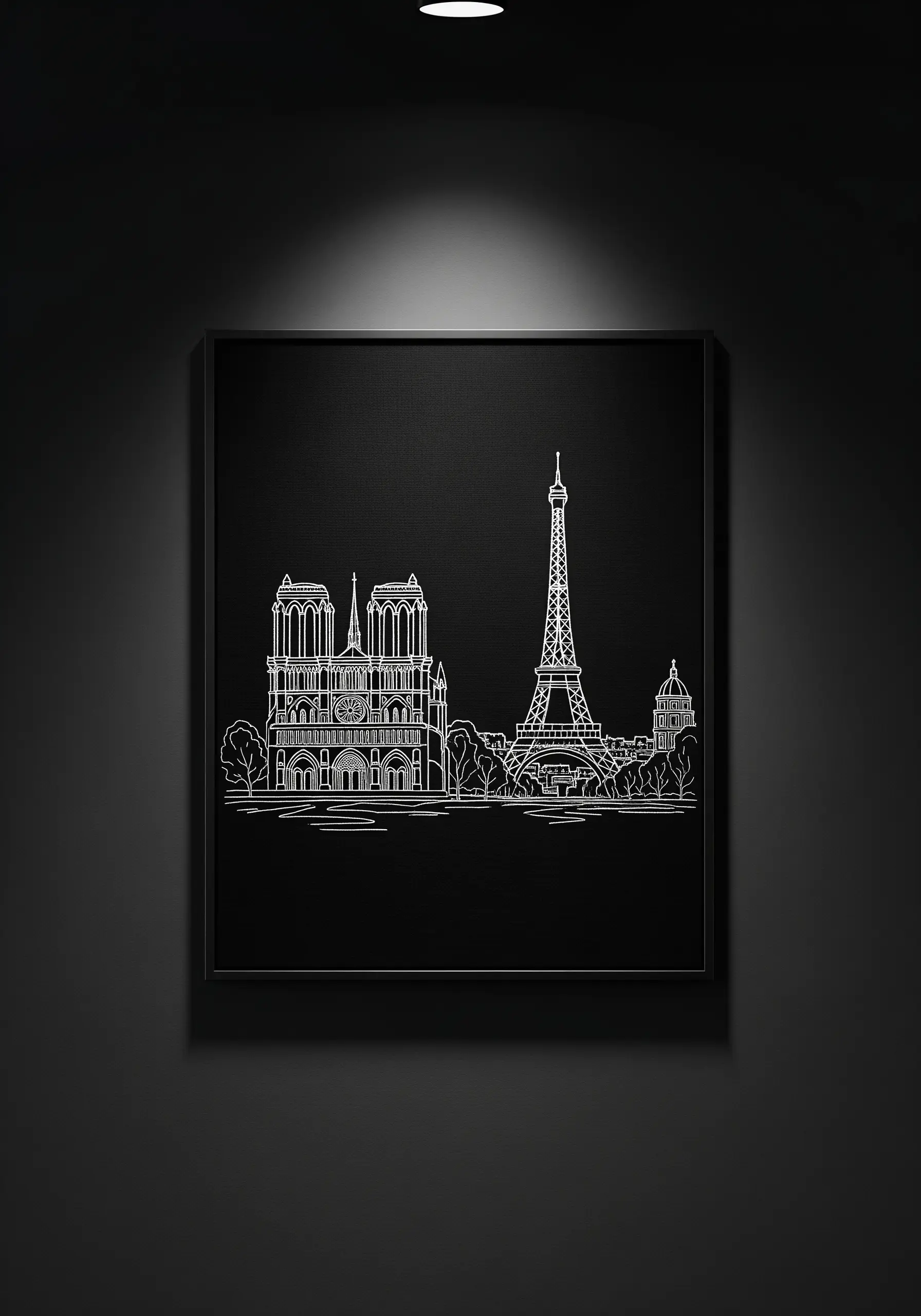 Minimalist line art embroidery of the Paris skyline on black fabric in a black frame.