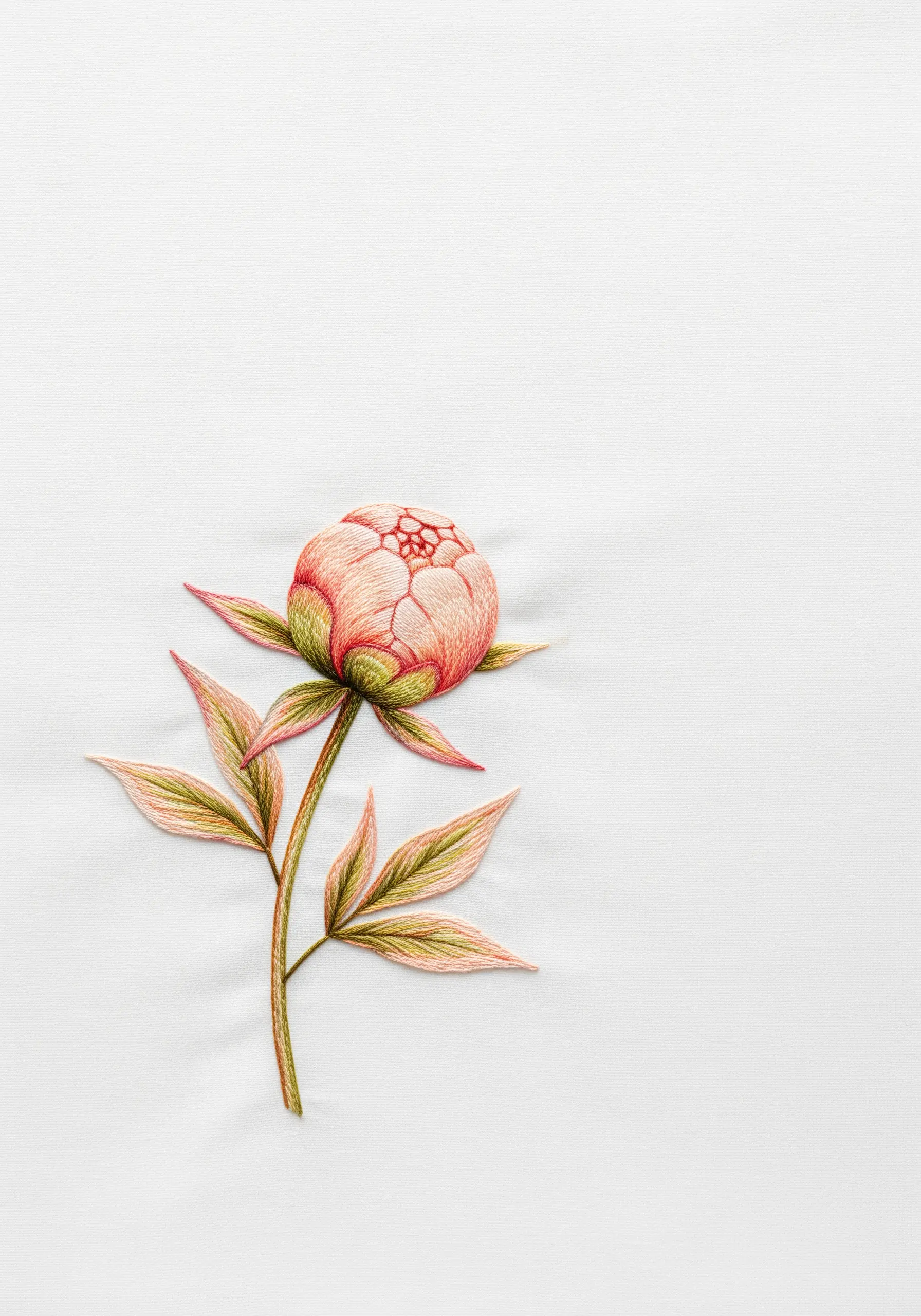 A single, delicately stitched peony bud with a stem on a clean white linen background.