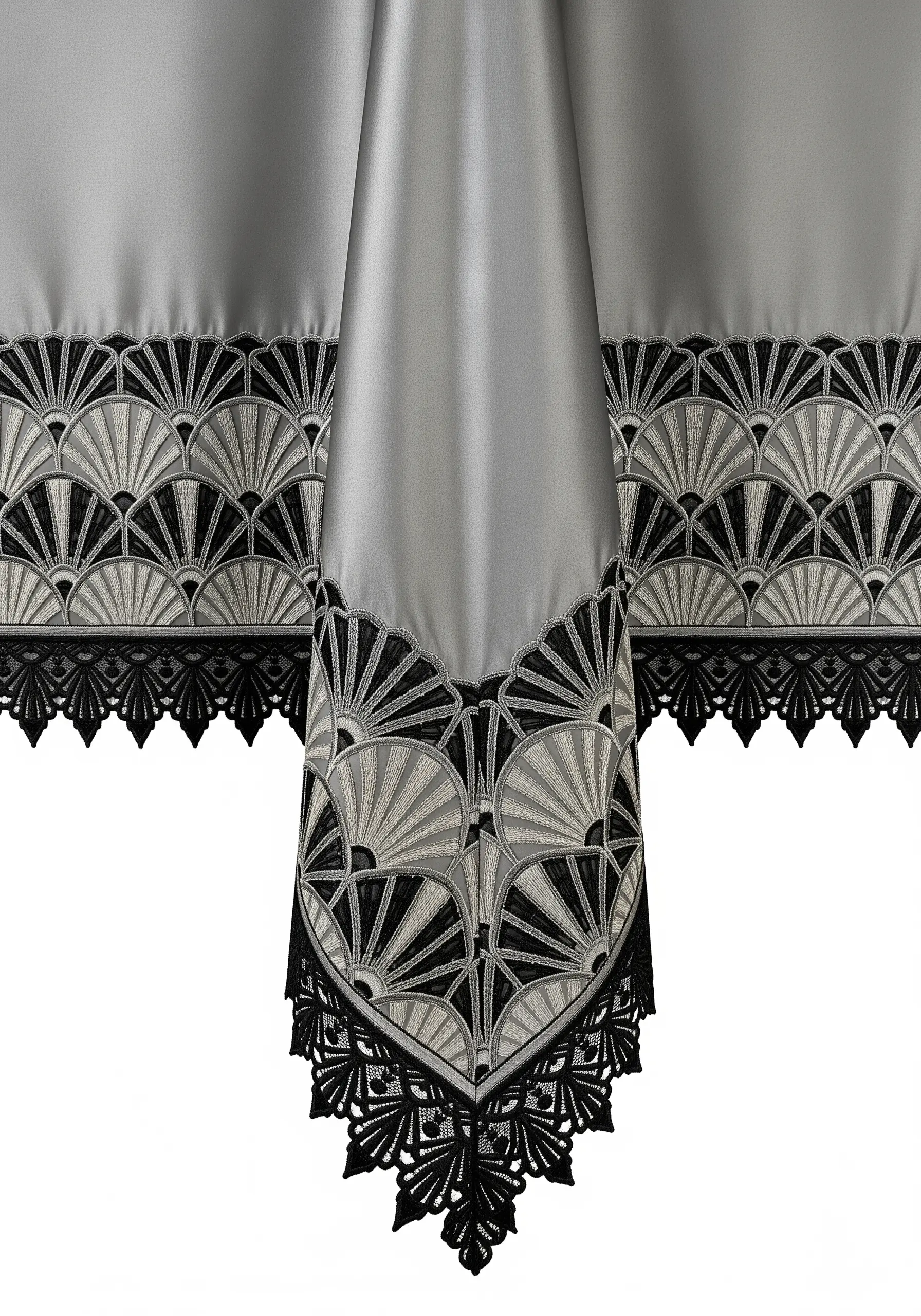 Black and silver Art Deco fan embroidery on the corner of a grey satin tablecloth.