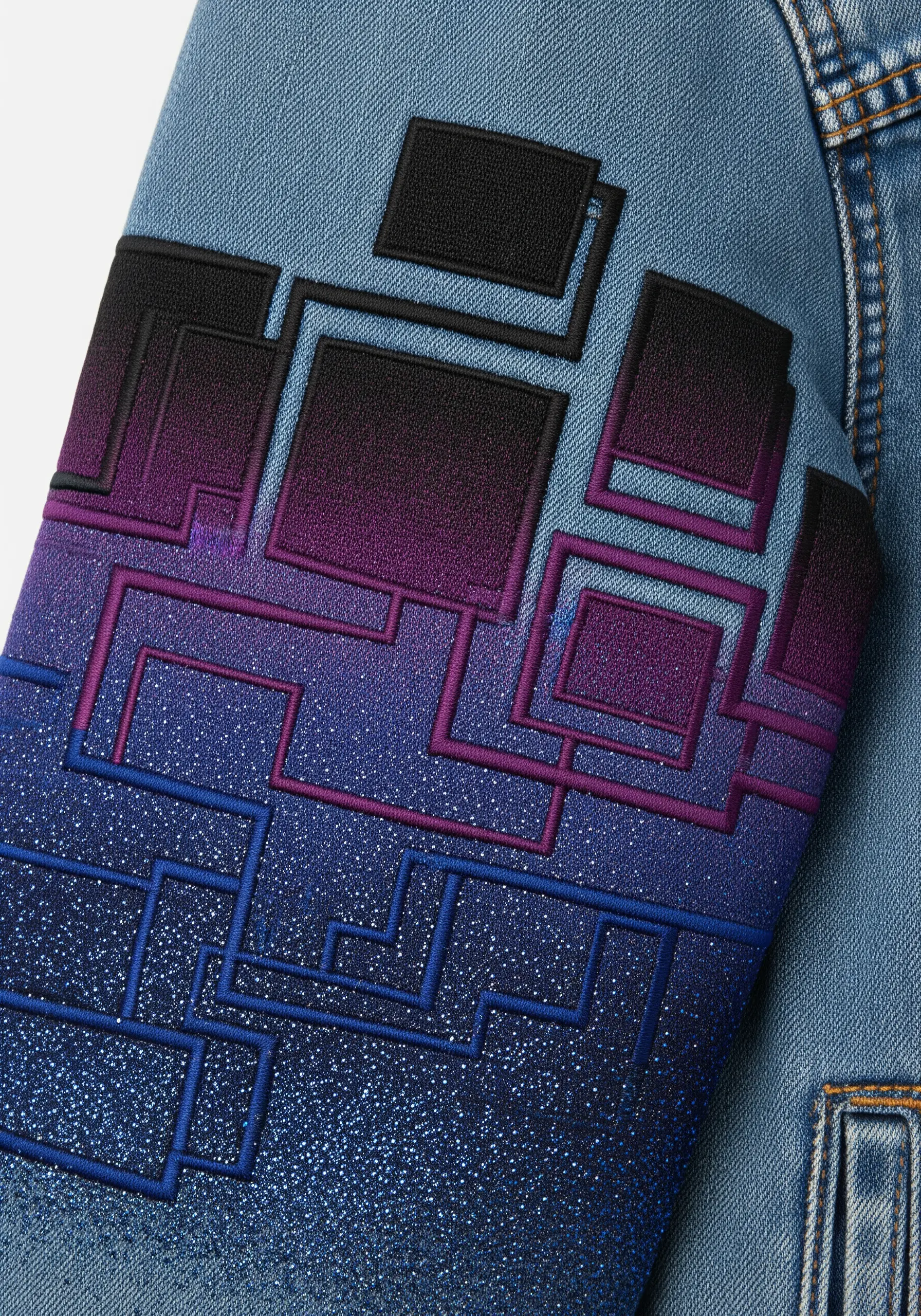 A futuristic geometric design on a jacket sleeve with a purple-to-blue gradient and spray-paint effect.