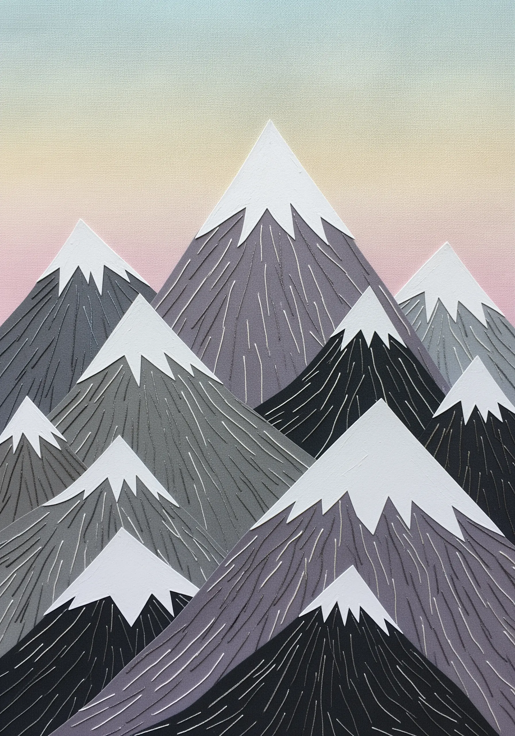 Paper collage of mountains with straight stitches used to create texture and shadow