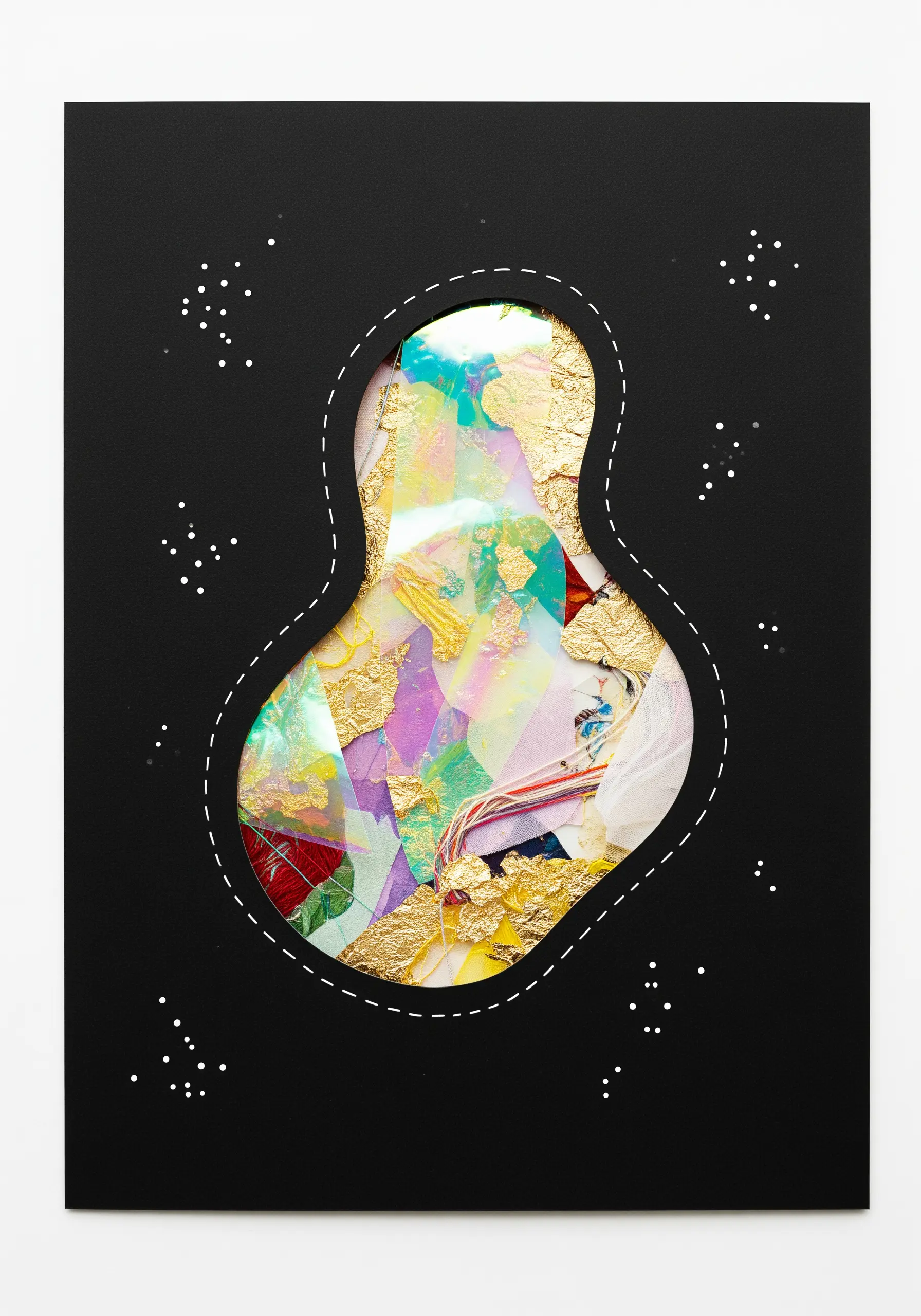 A black paper with a cutout, revealing a colorful foil collage underneath, framed by a running stitch.