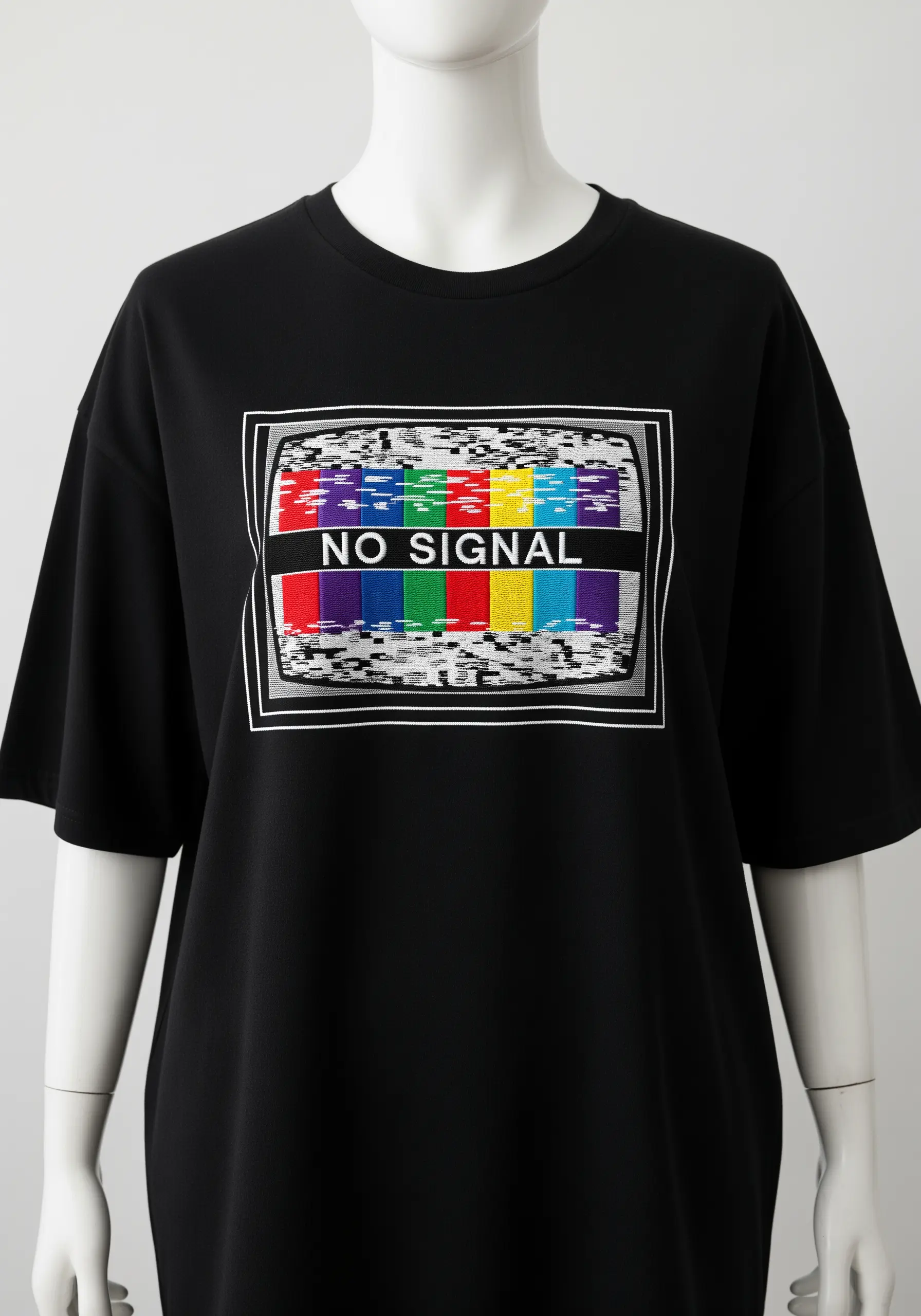 Embroidered 'No Signal' TV screen with colorful static made from dense satin stitches.