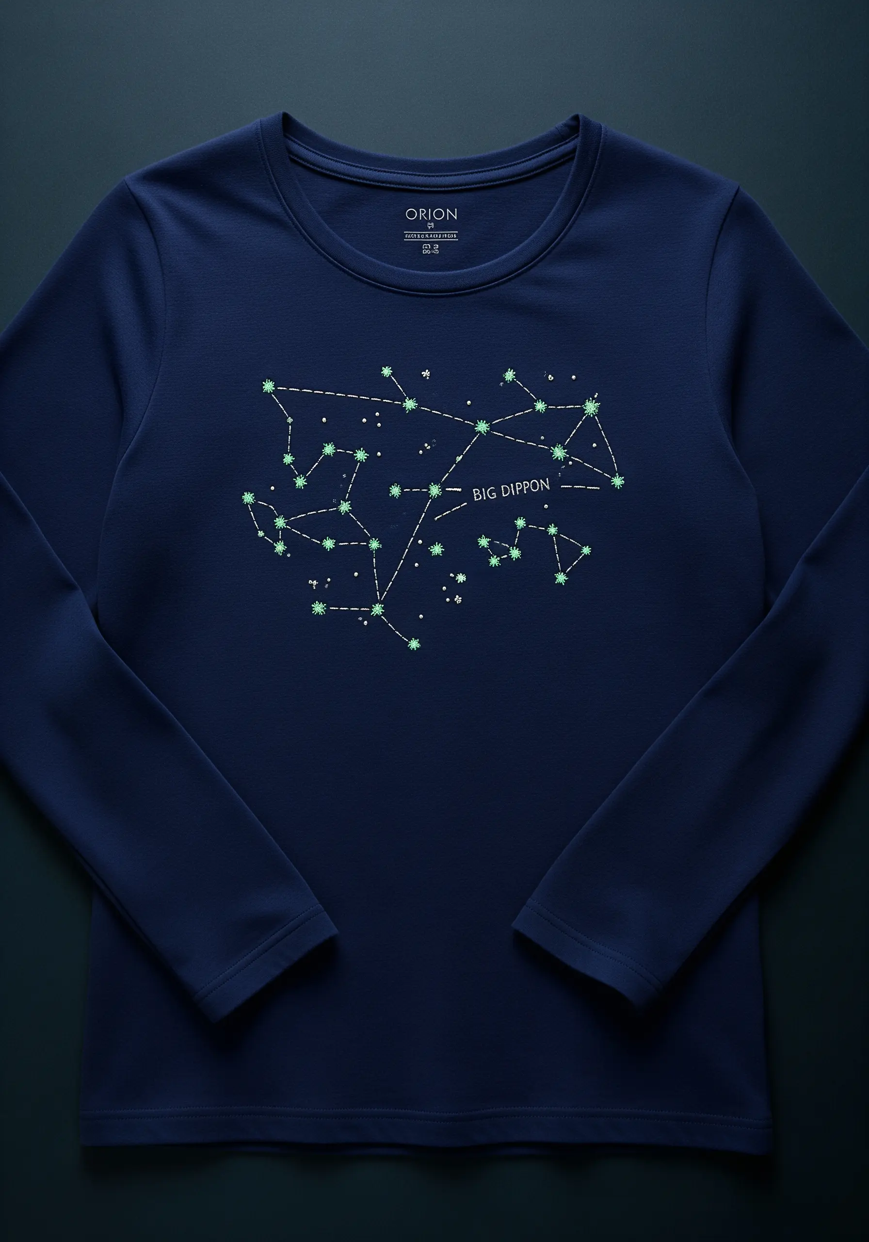 Big Dipper constellation embroidered with glow-in-the-dark thread on a navy blue shirt.