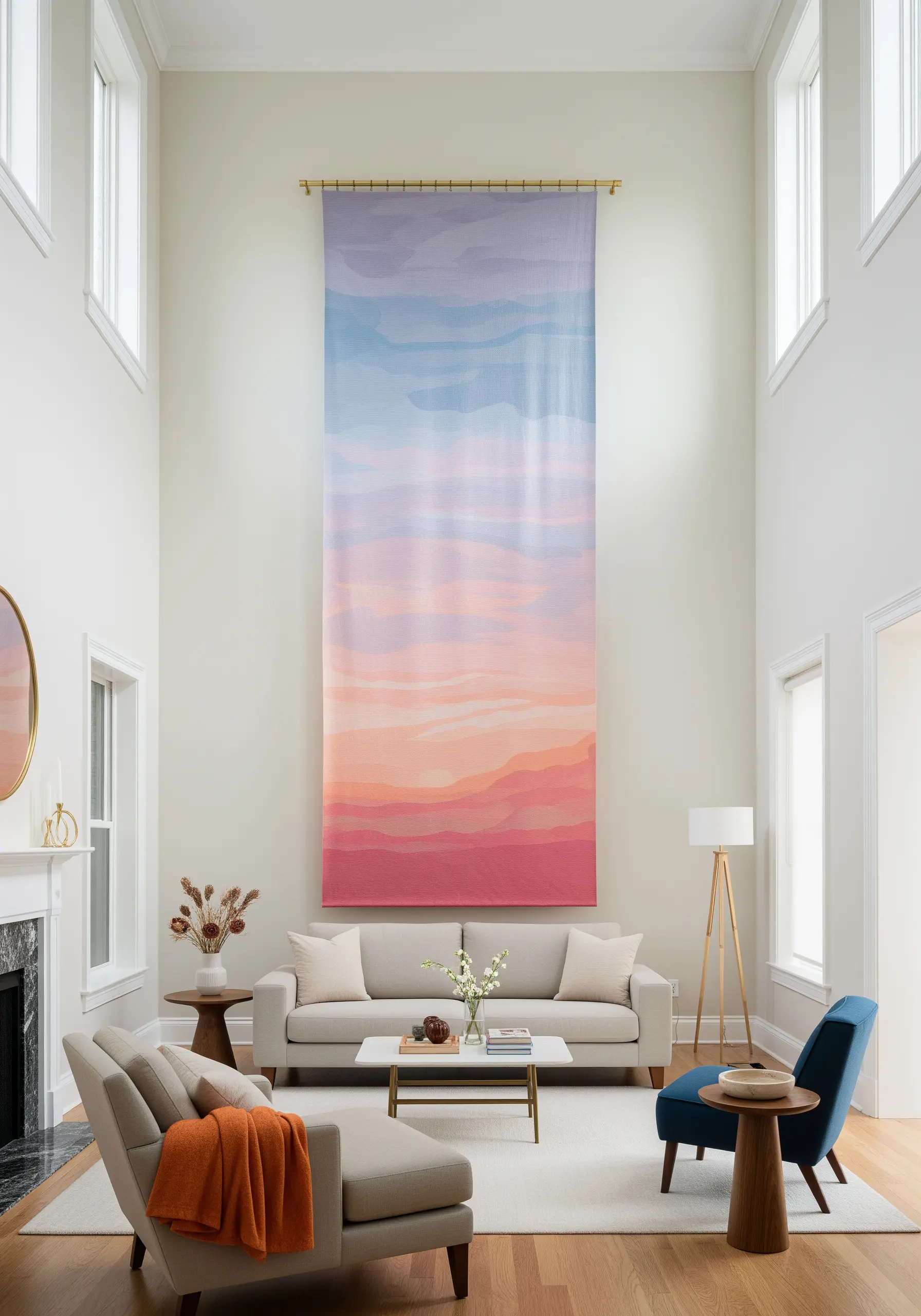 A very large embroidered wall tapestry of a colorful sunset gradient hanging in a living room