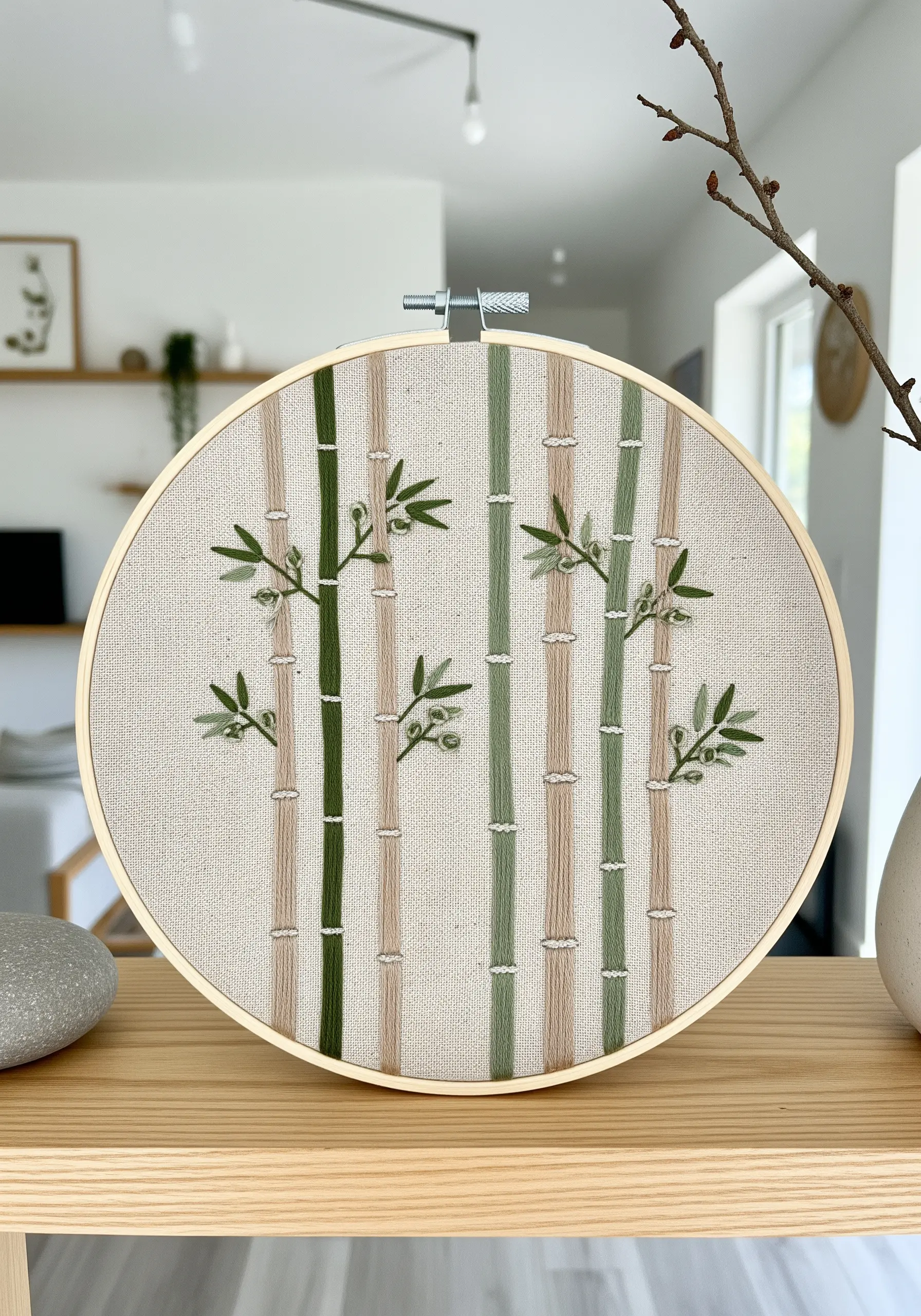 Minimalist embroidery of bamboo stalks using vertical satin stitches and small leaves.