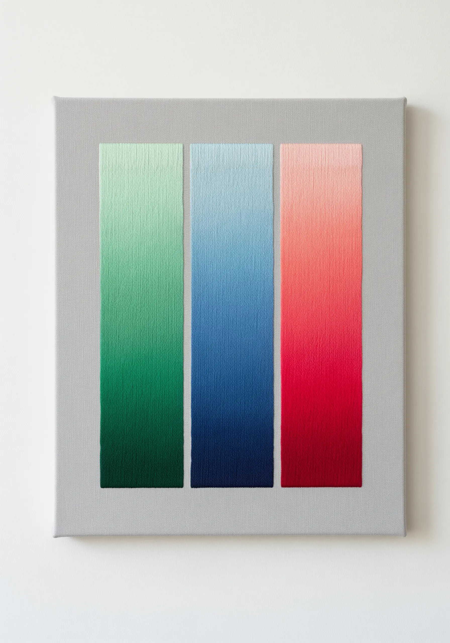 Three embroidered rectangles on canvas, each showing a perfect color gradient.
