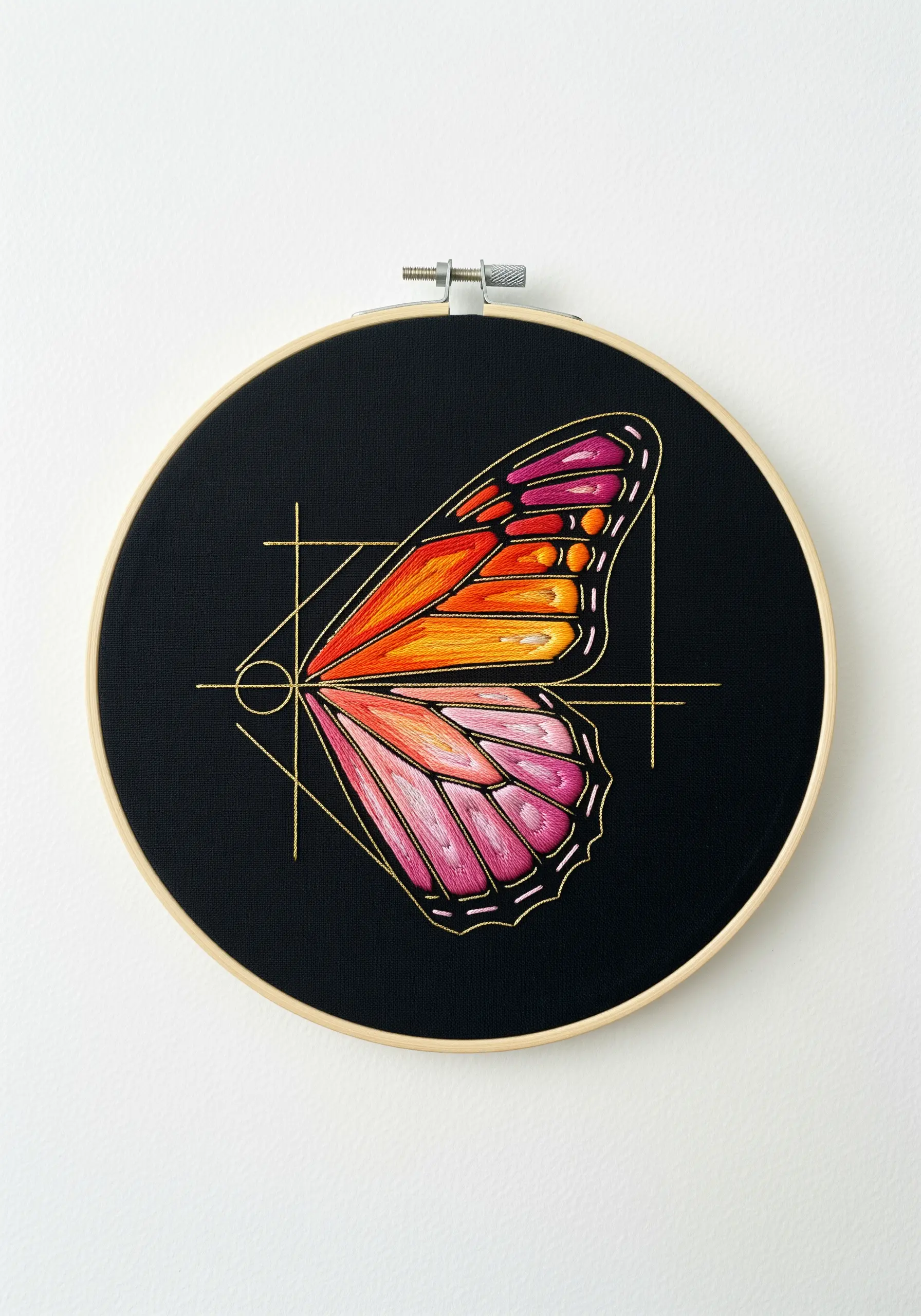 A butterfly wing filled with sunset colors, overlaid with gold geometric lines.