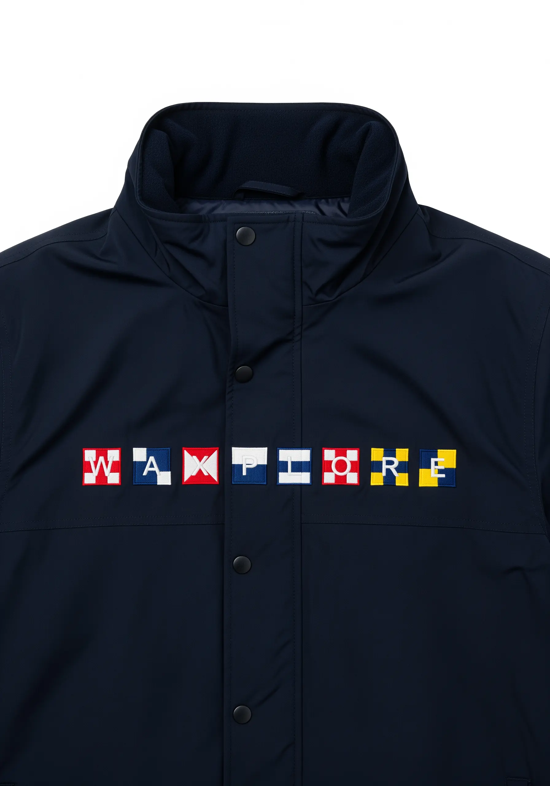 A row of embroidered nautical signal flags spelling a word on a navy blue jacket.