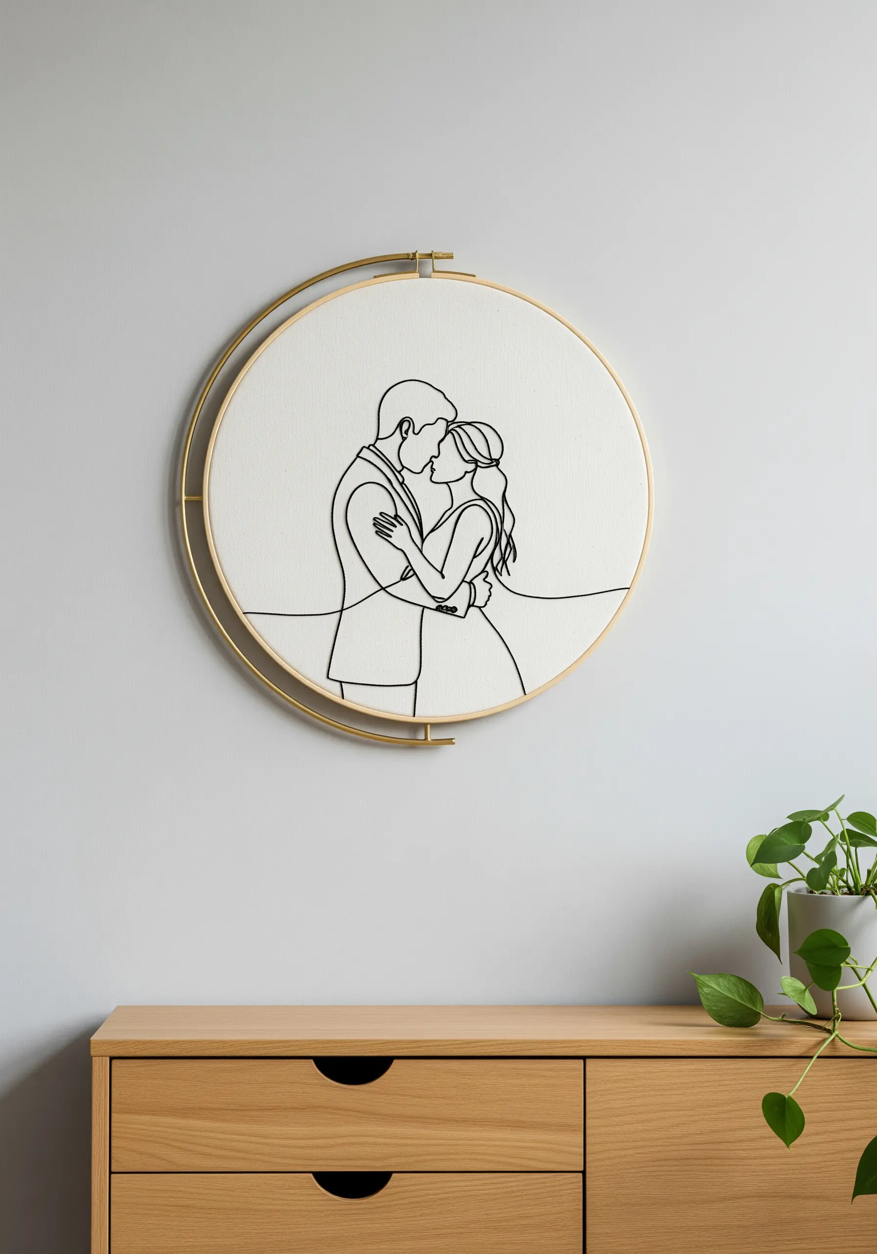 Minimalist single-line embroidery of a couple embracing, stitched in black on white canvas.